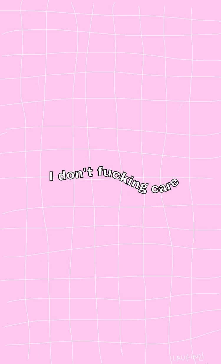 Pink Grid 桌布 壁紙 — 粉紅色背景，白色網格線，粗體文字寫著「I don't fucking care」，字體隨意。