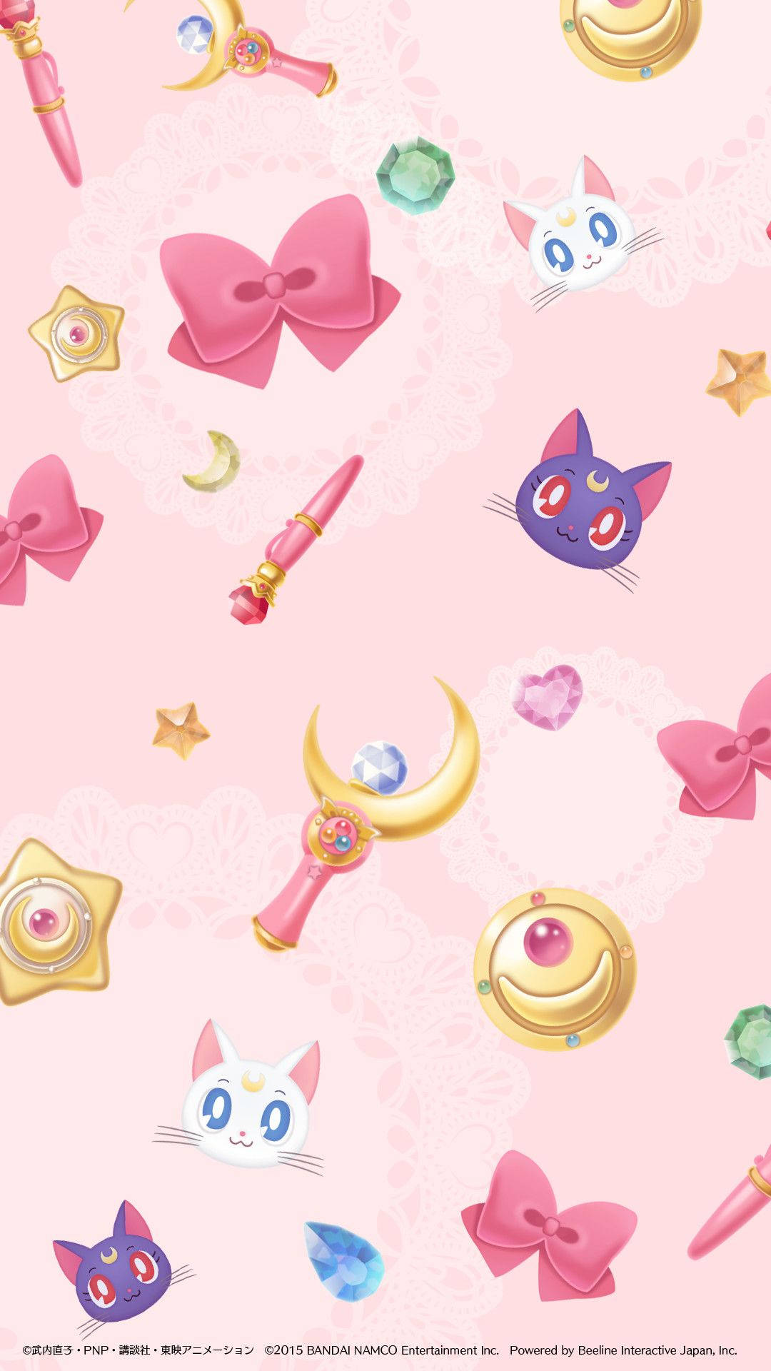 Sailor Moon主題桌布，帶有粉紅色蝴蝶結、新月和貓咪吉祥物。