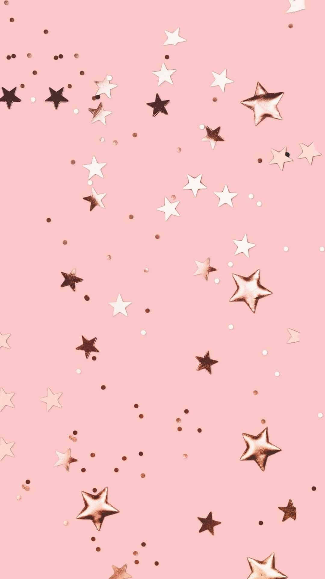 Aesthetic Rose Gold 桌布 壁紙 — 粉紅色背景，點綴著散落的金屬玫瑰金和白色星星及小圓點。