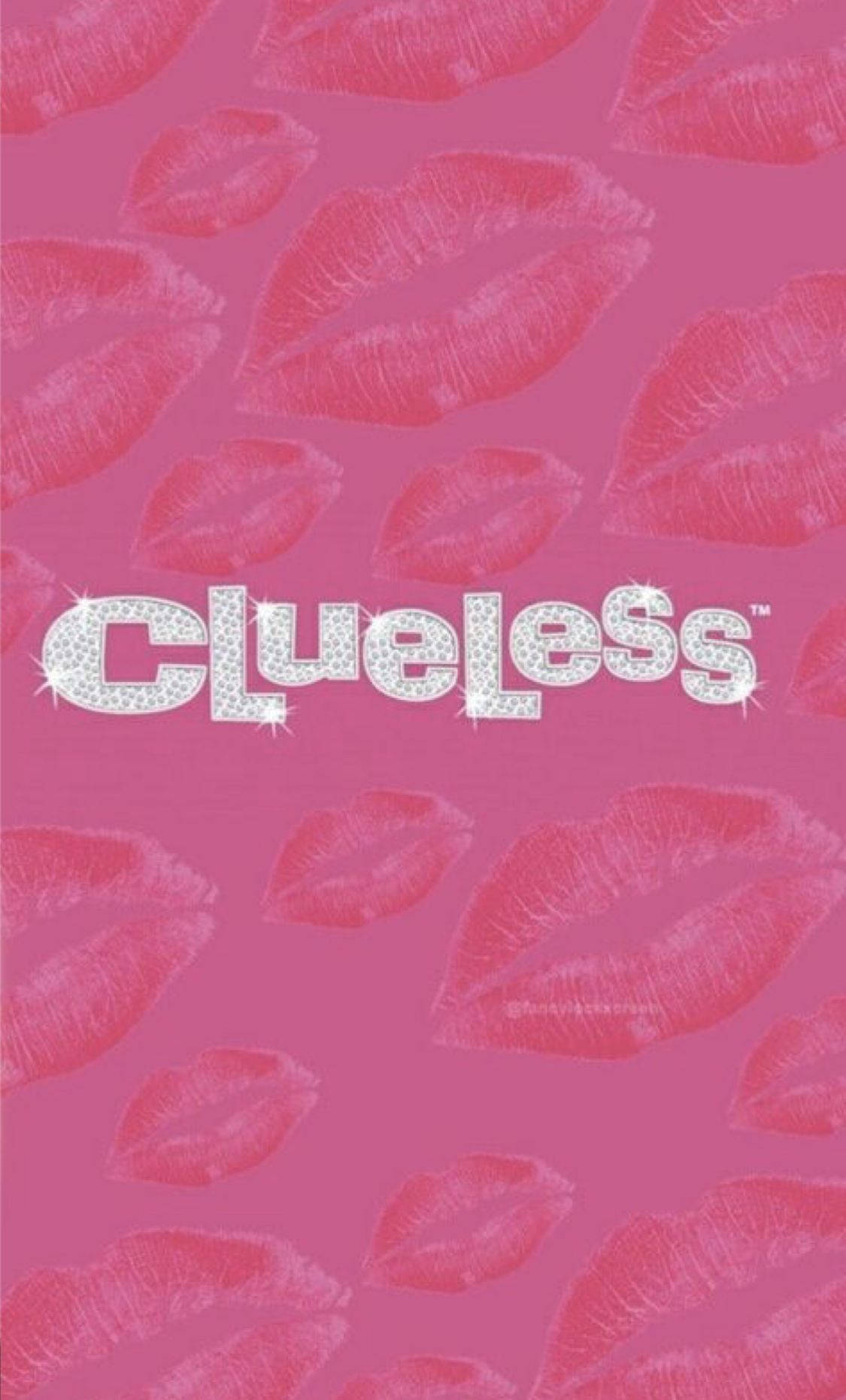Y2K 桌布 壁紙 — 粉紅色背景上佈滿紅色唇印，中央是閃亮的「Clueless」標題。