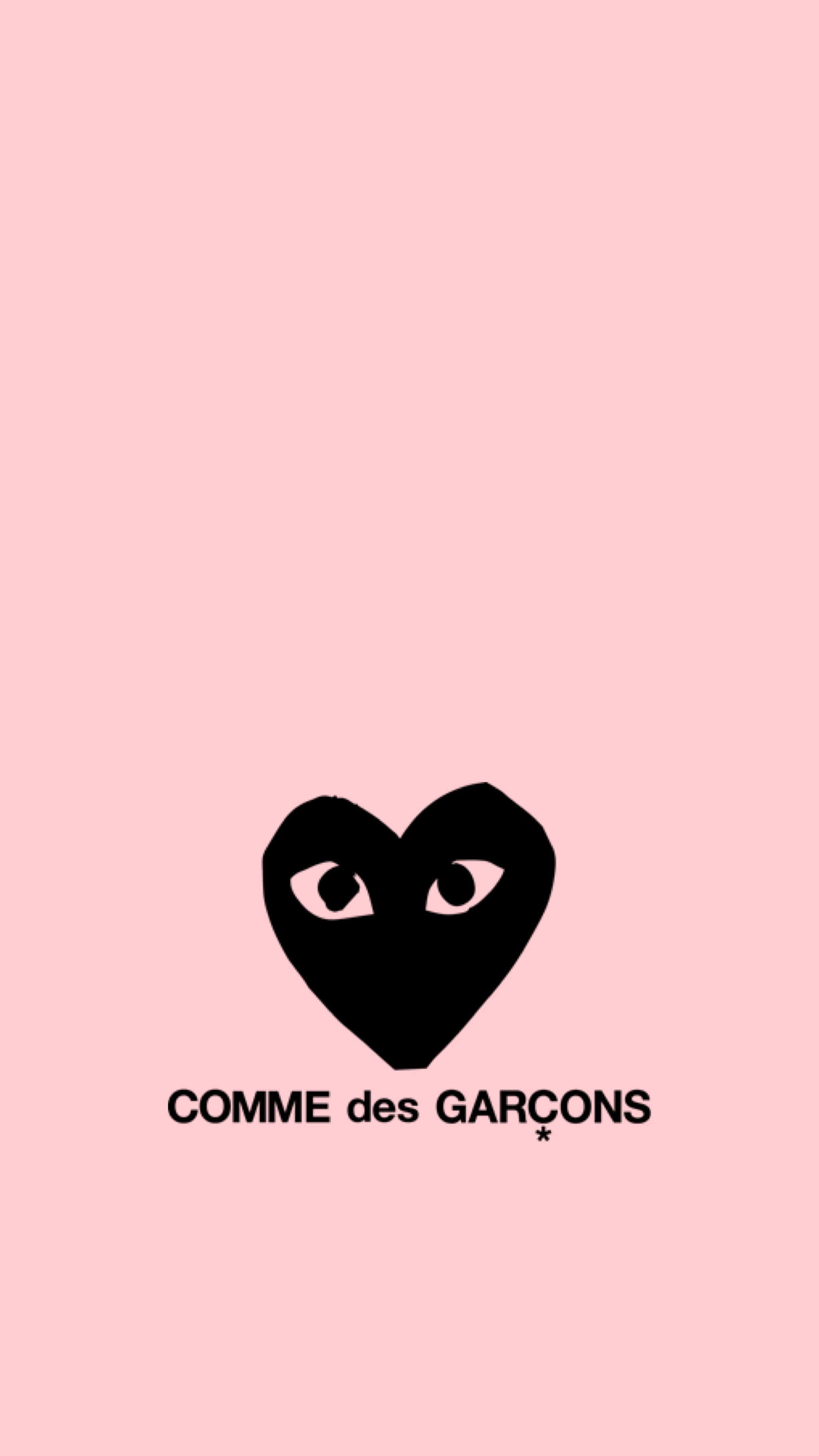 粉紅色背景上有「Come de Garons」字樣 壁紙