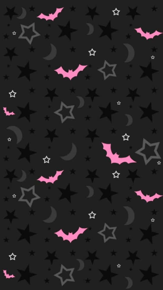 Pink Halloween 桌布 壁紙 — 粉紅色蝙蝠和星星在黑暗的夜空中漂浮，伴隨著新月和散落的星爆。