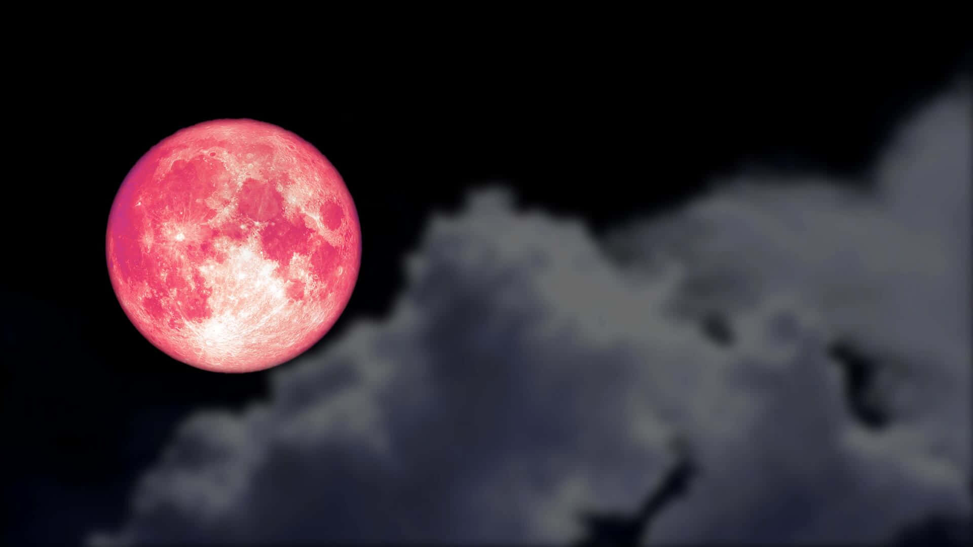 粉色月亮與灰色雲層 壁紙
