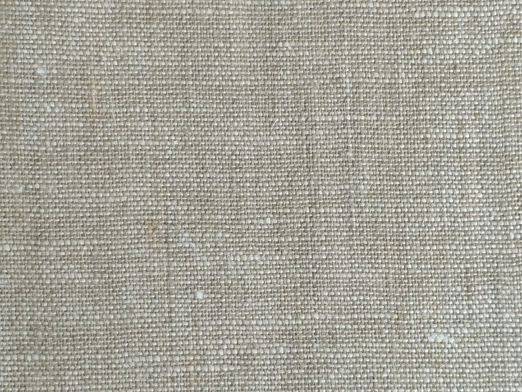 Fabric 桌布 壁紙 — 粗米色亞麻布料的特寫，可見編織紋理和細微的自然瑕疵。
