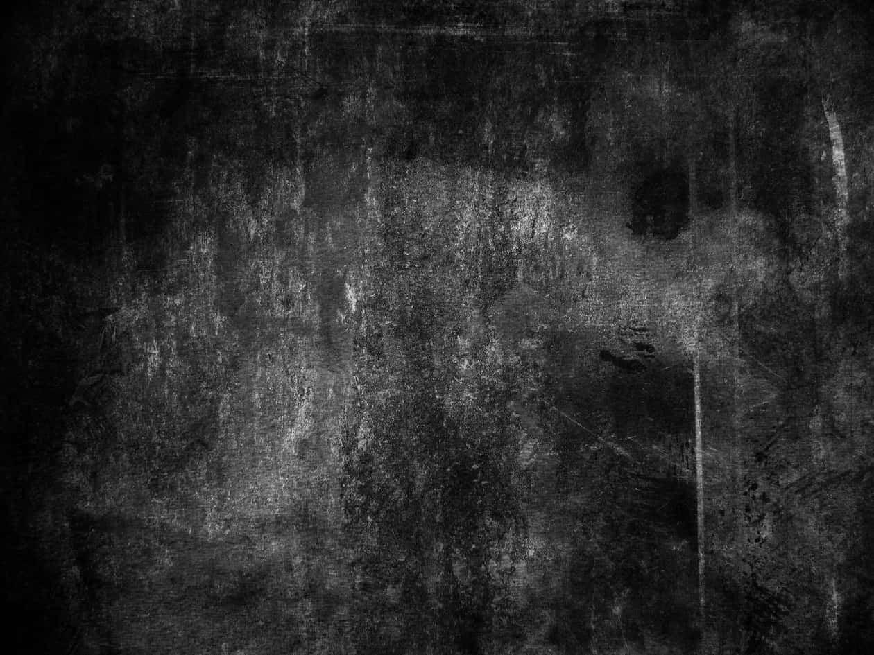 Black And White Texture 桌布 壁紙 — 粗糙的單色紋理，帶有深邃黑色和抹污的污垢，顯露出磨損的表面。