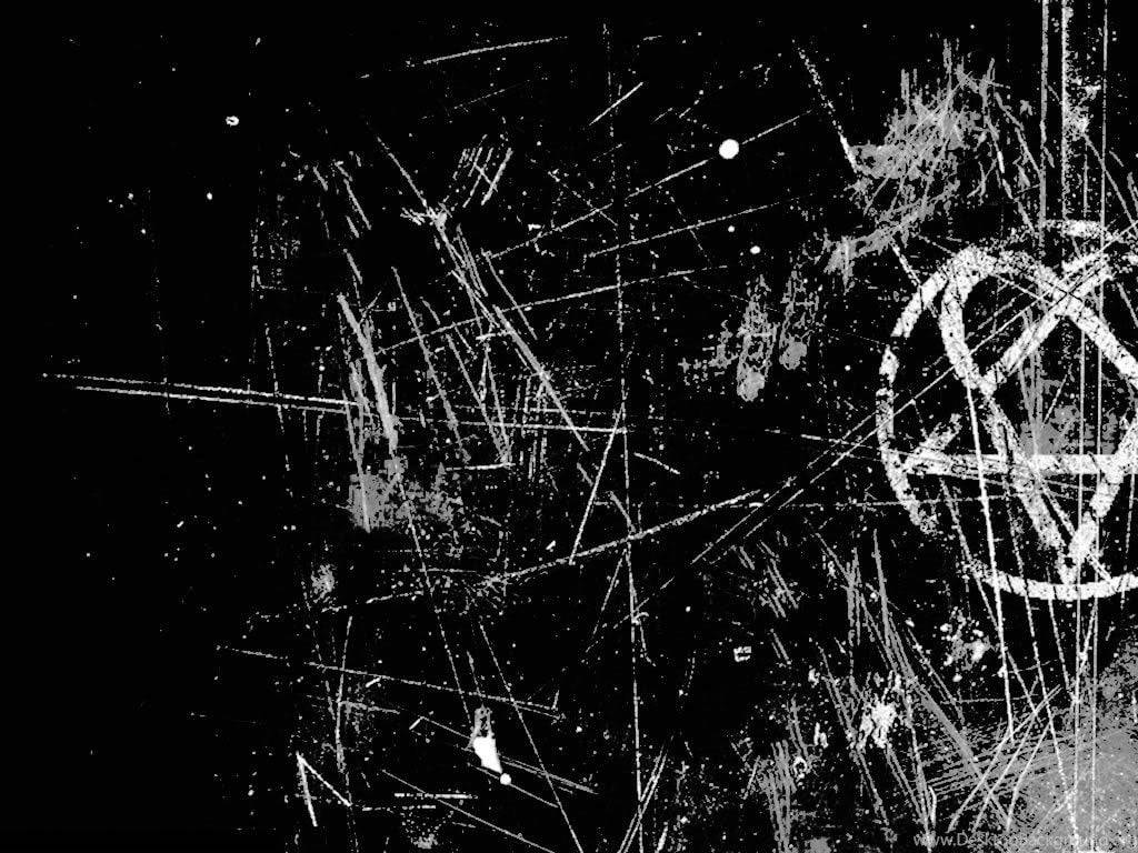 Grunge Texture 桌布 壁紙 — 粗糙的黑白抽象構圖，帶有混亂的刮痕和五角星符號。