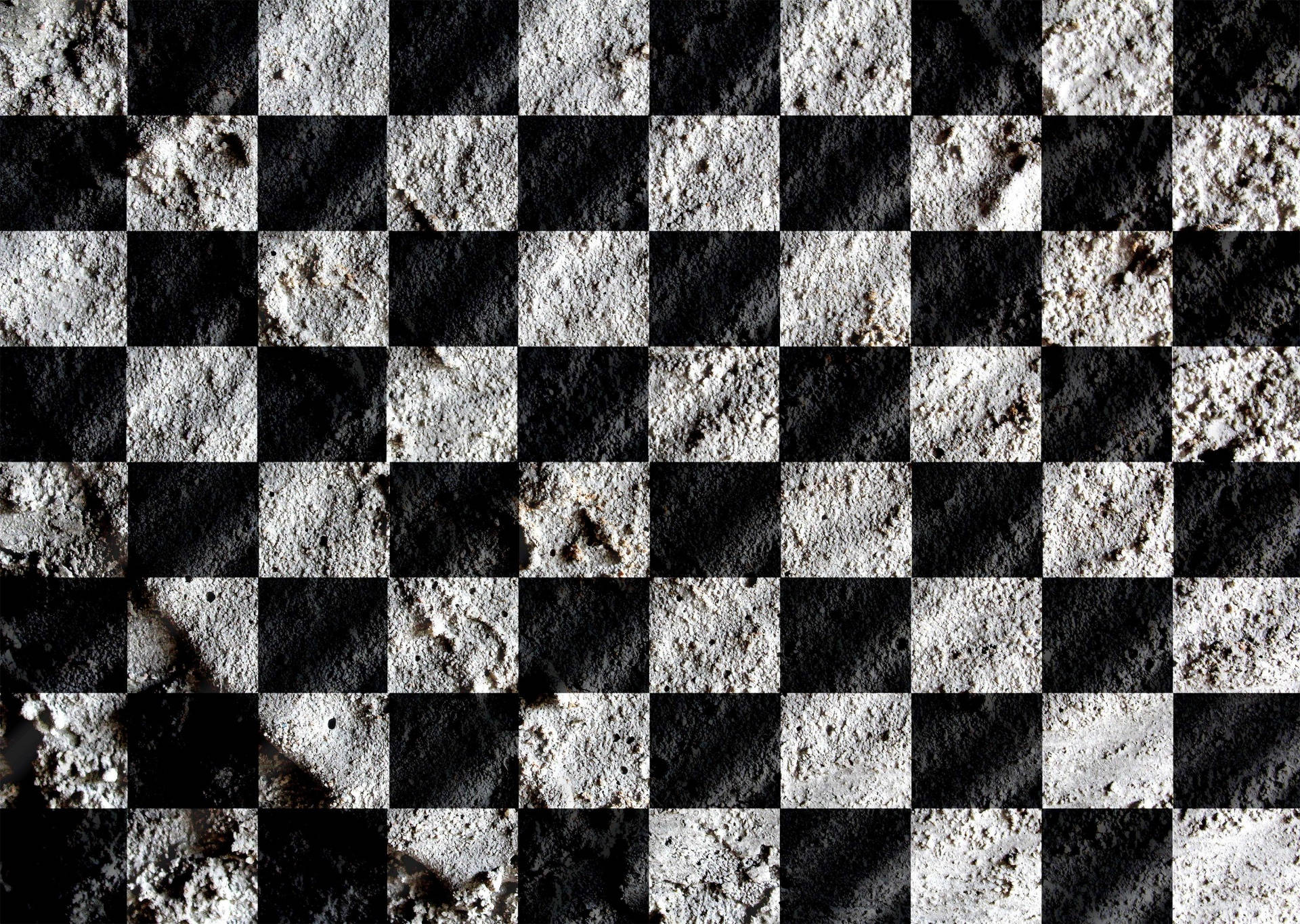 Checkered Flag 桌布 壁紙 — 粗糙的黑白棋盤格圖案，帶有類似磨損混凝土或瀝青的粗糙紋理方塊。