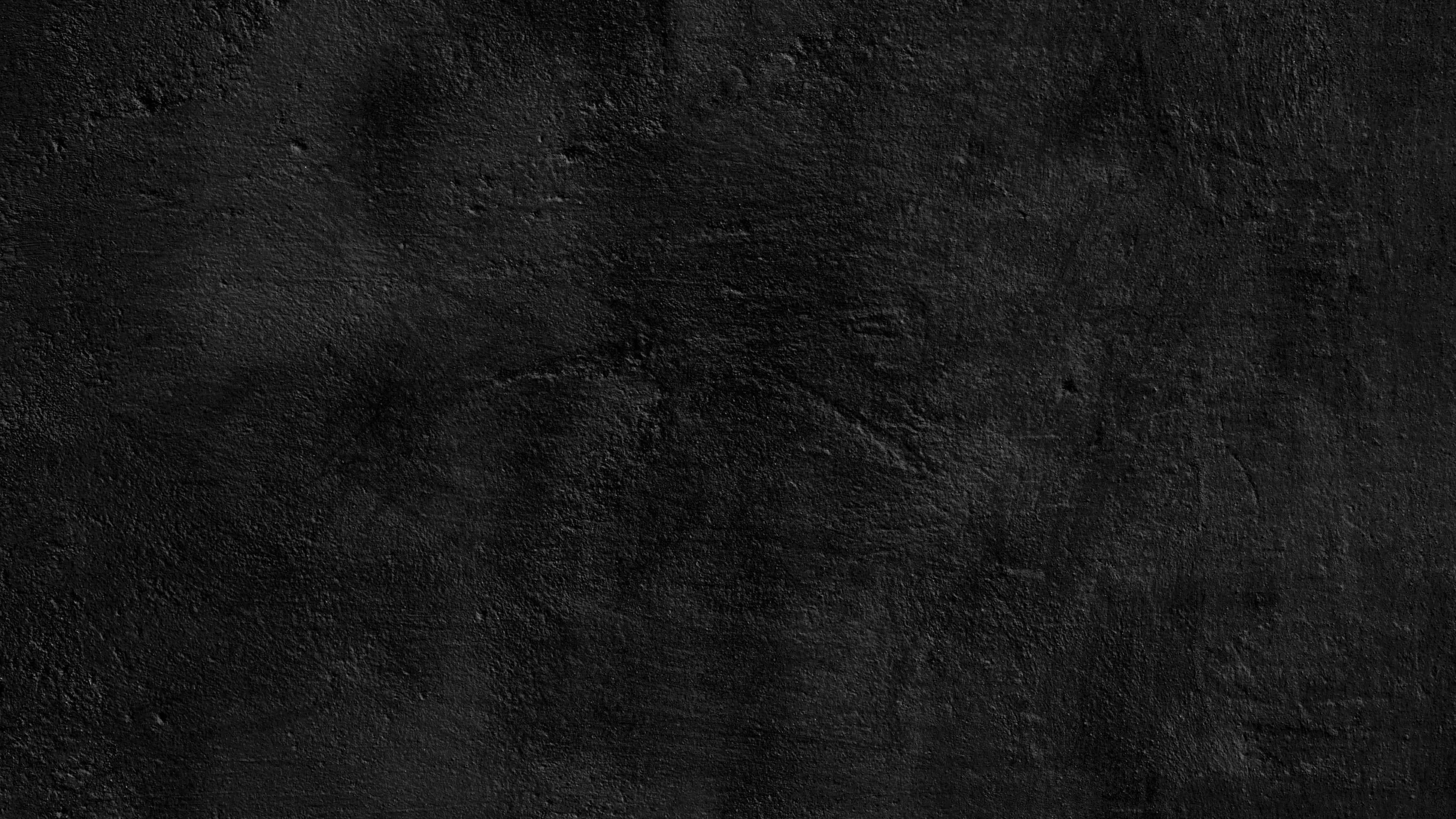 Aesthetic Black Grunge 桌布 壁紙 — 粗糙黑色紋理表面的特寫，色調和深度有細微變化。