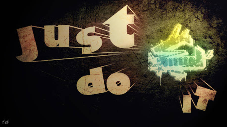 Just Do It 桌布 壁紙 — 粗體3D字母在深色紋理背景上拼出「Just Do It」，帶有發光霓虹燈點綴。