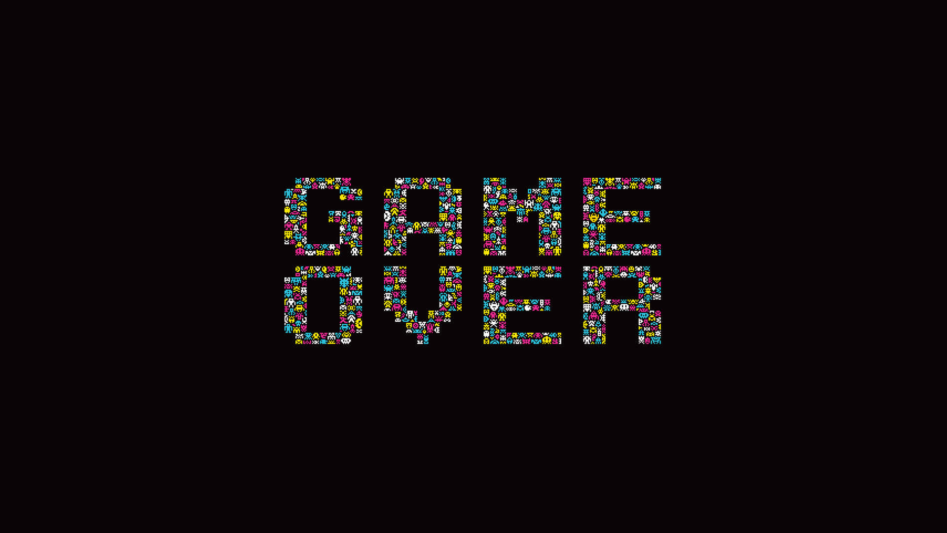 Online Gaming 桌布 壁紙 — 粗體像素化的「GAME OVER」文字，以鮮豔彩虹色呈現，背景為純黑色。