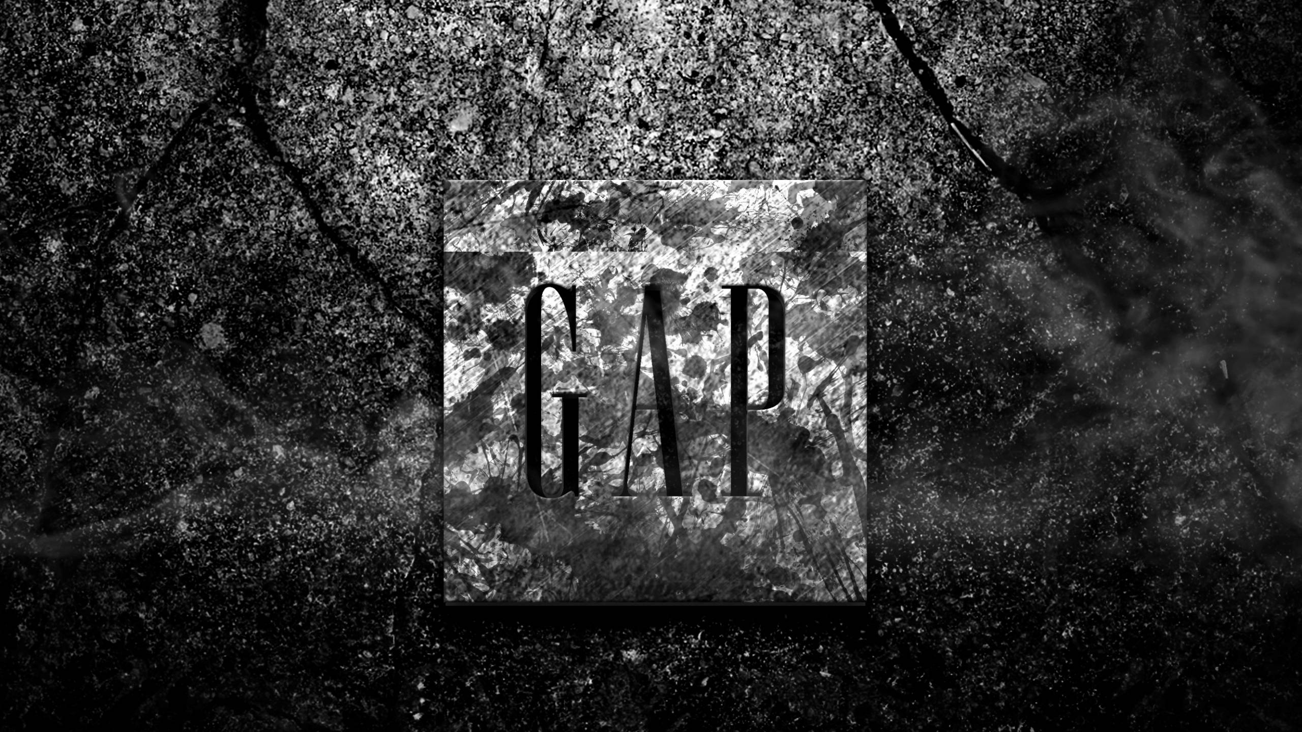 Gap 桌布 壁紙 — 粗體字GAP居中位於一個有紋理的方形上，背景為粗糙的黑白裂紋背景。
