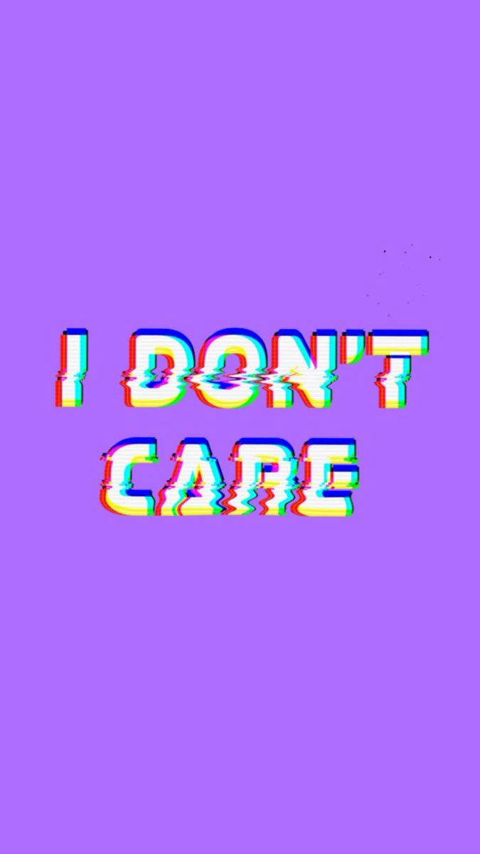 Purple Aesthetic iPhone 桌布 壁紙 — 粗體故障風格文字 'I DON'T CARE' 顯示在純紫色背景上，帶有色彩像差效果。