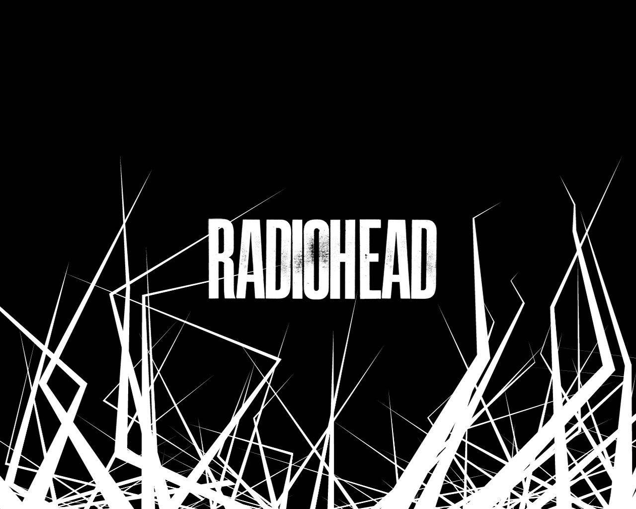 band 桌布 壁紙 — 粗體白色 'RADIOHEAD' 文字置中於黑色背景，底部爆發出混亂的白色抽象線條。