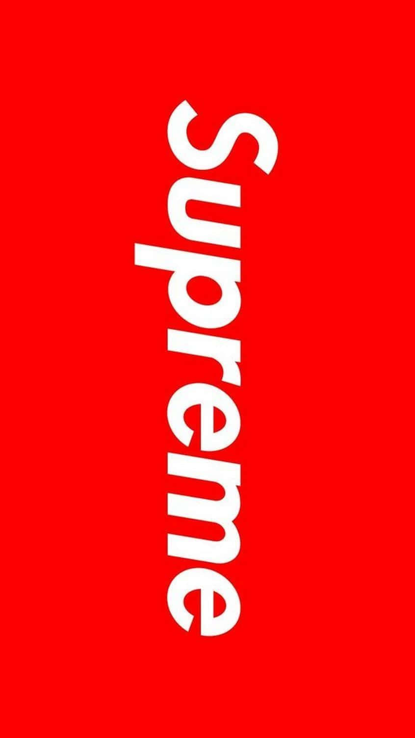 Supreme Logo 桌布 壁紙 — 粗體白色「Supreme」標誌垂直居中於純紅色背景上。