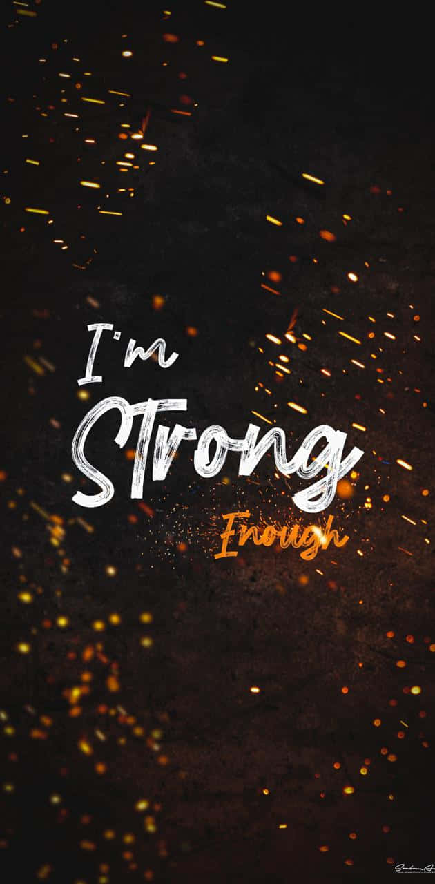 Quote 桌布 壁紙 — 粗體白色和橙色文字顯示「I'm Strong Enough」，背景為深色，帶有發光的金色火花。