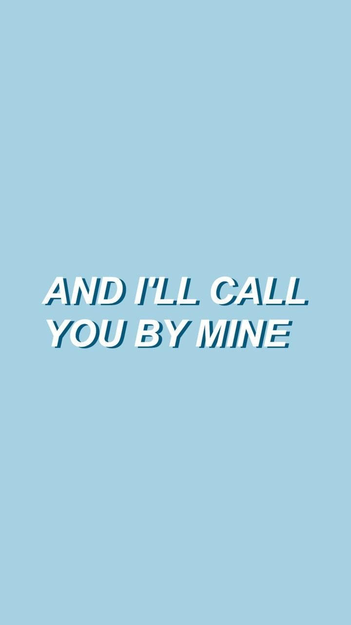 Quote 桌布 壁紙 — 粗體白色文字「AND I'LL CALL YOU BY MINE」居中顯示在純淺藍色背景上。