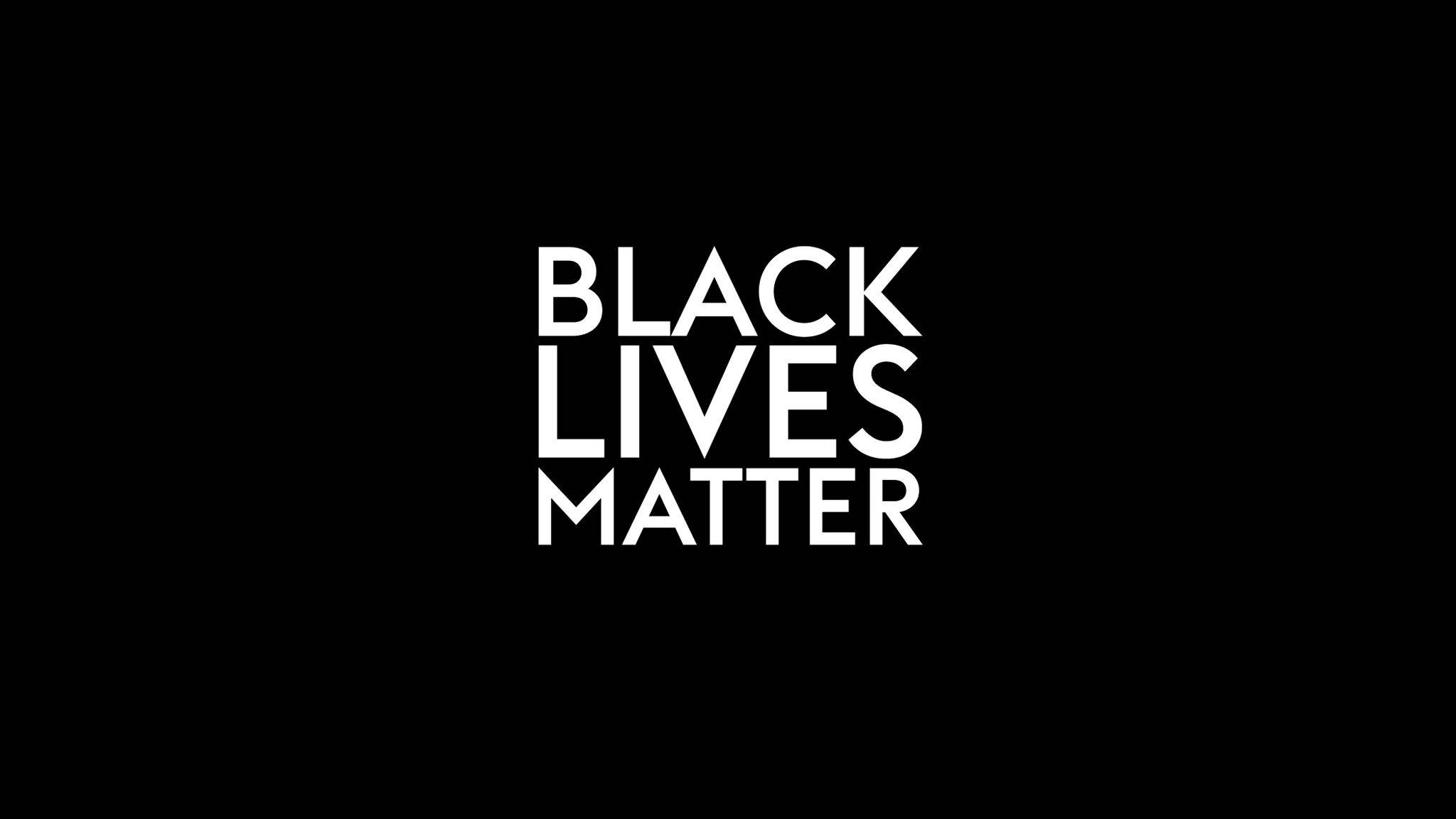 USA 桌布 壁紙 — 粗體白色文字 'BLACK LIVES MATTER' 居中顯示在純黑色背景上。