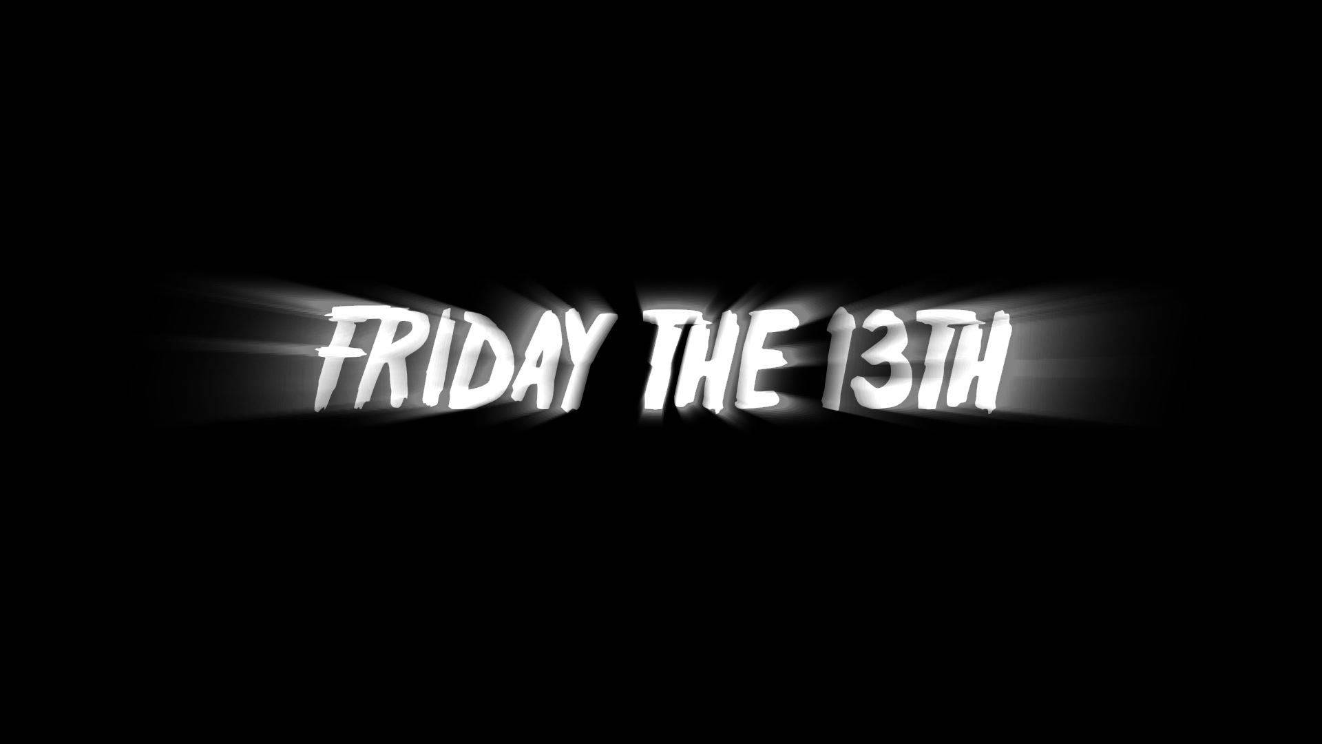 Friday 桌布 壁紙 — 粗體白色文字 'FRIDAY THE 13TH' 在黑色背景上發光，帶有戲劇性的光線。