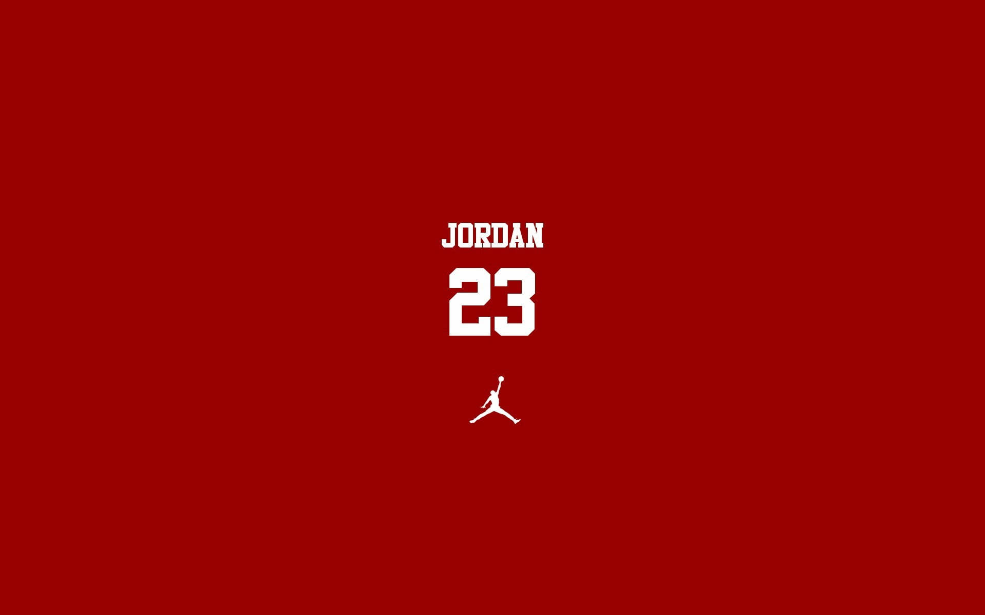 Jordan Logo 桌布 壁紙 — 粗體白色文字 JORDAN 23 及 Jumpman 標誌居中於純深紅色背景上。