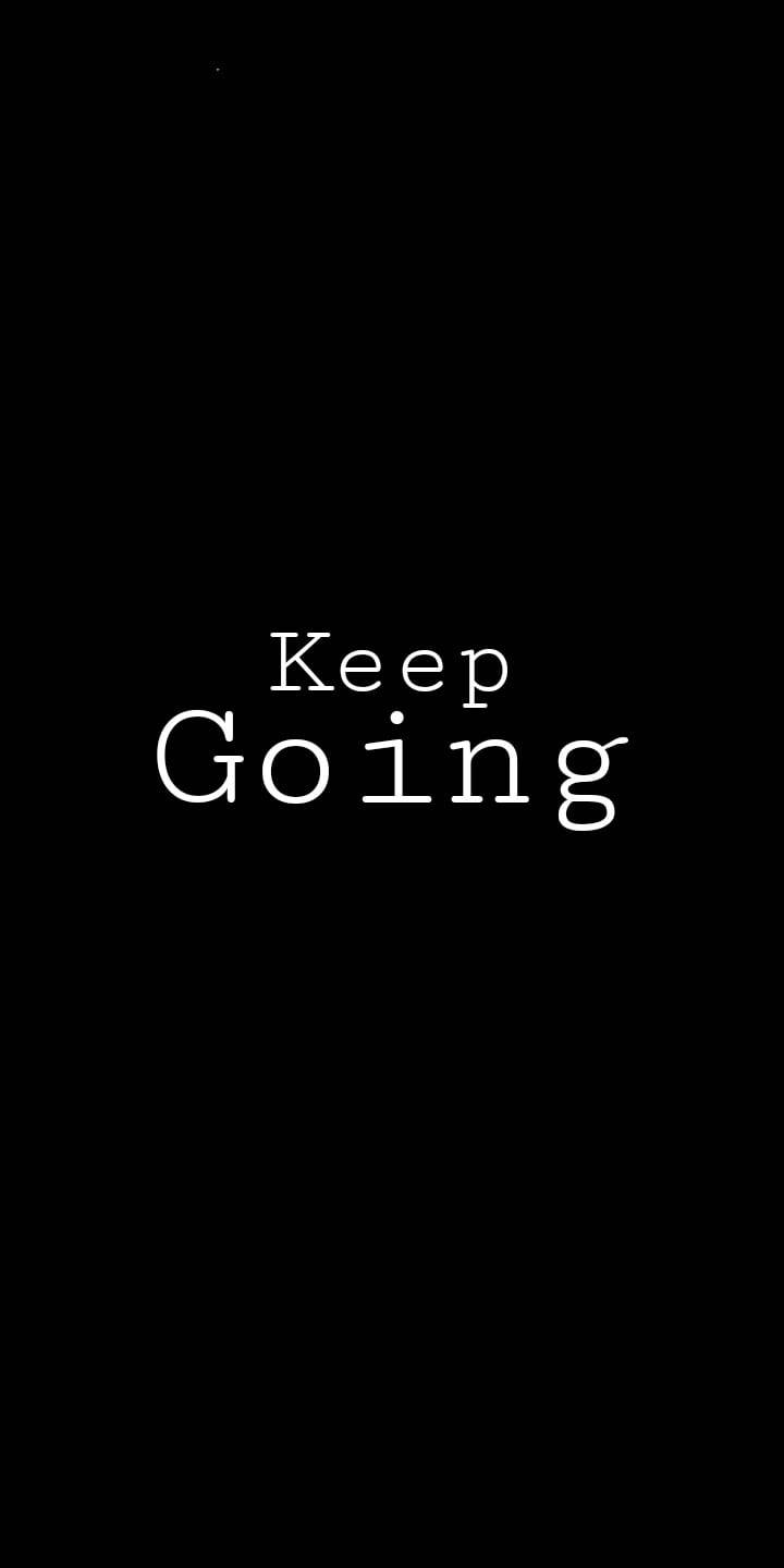 黑色 桌布 壁紙 — 粗體白色文字「Keep Going」居中顯示在純黑色背景上。