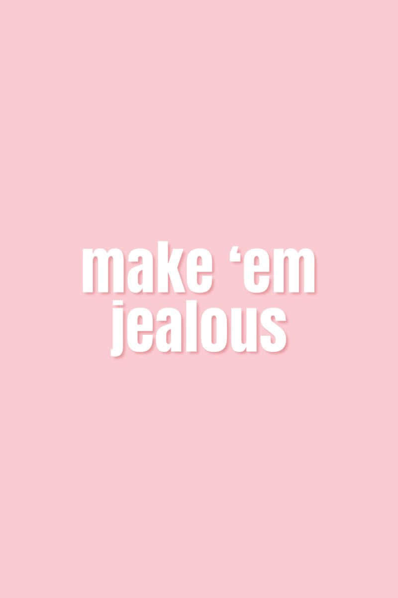 Pink Quote 桌布 壁紙 — 粗體白色文字「make 'em jealous」居中顯示在純色粉彩粉紅色背景上。