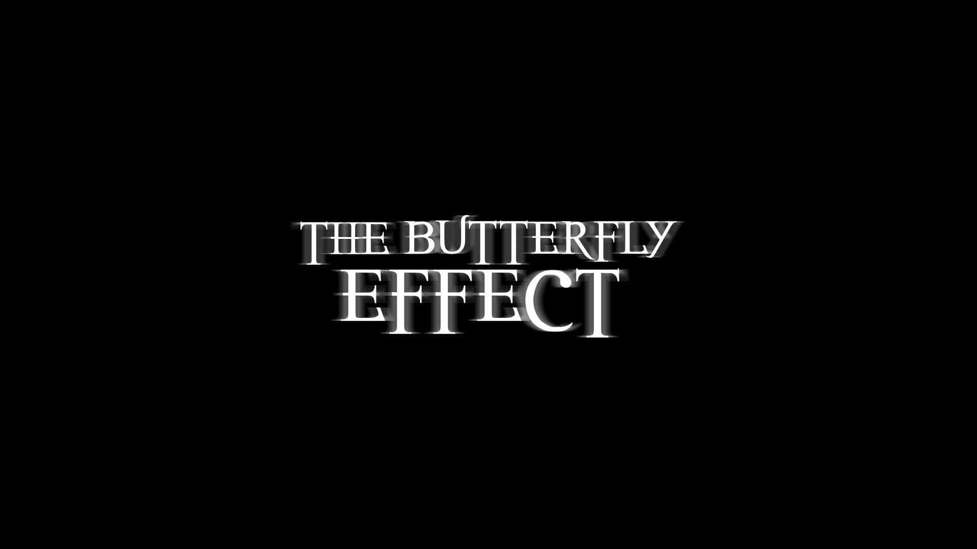 Butterfly Effect 桌布 壁紙 — 粗體白色文字「THE BUTTERFLY EFFECT」居中顯示在帶有微妙陰影的純黑色背景上。