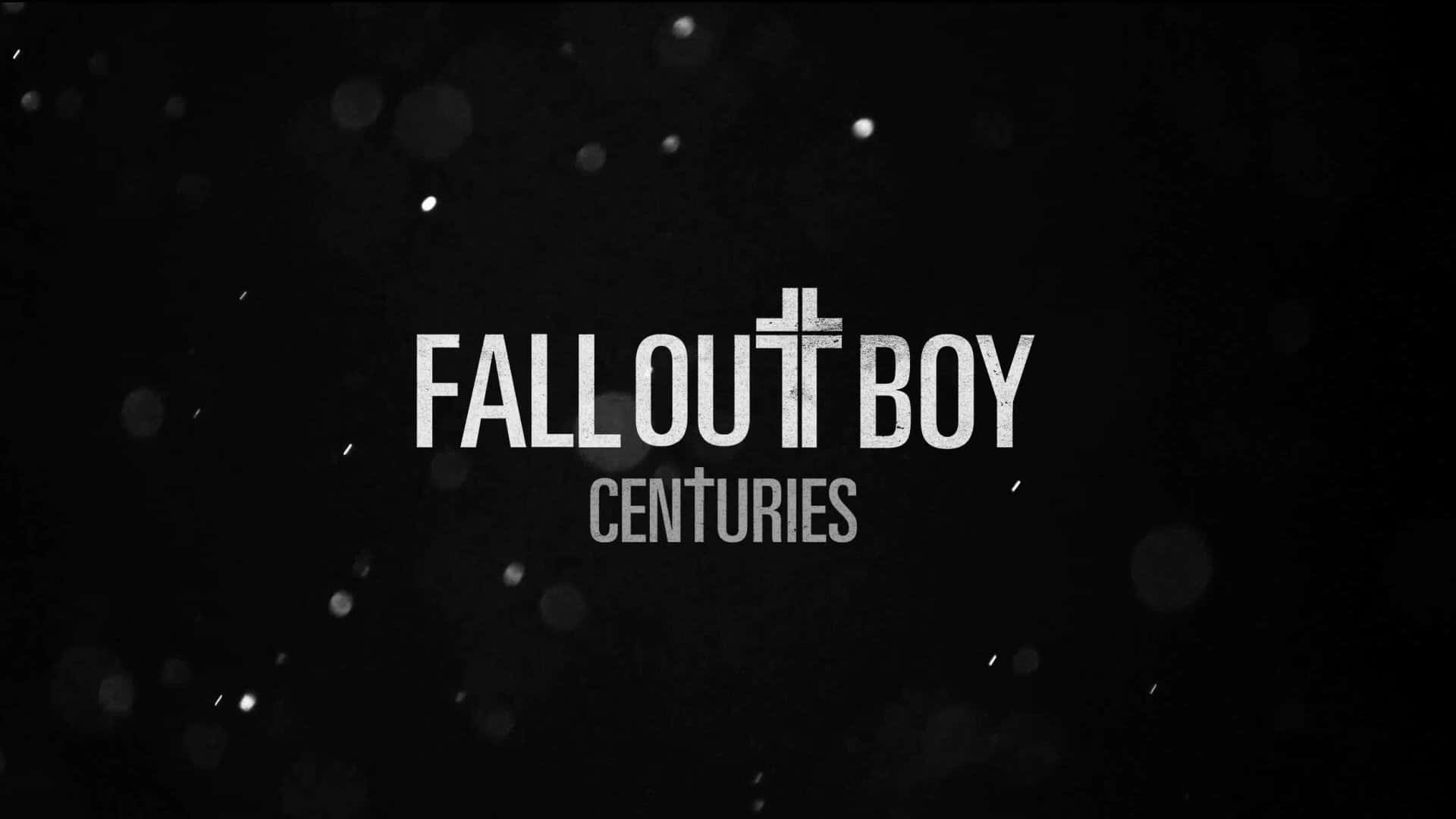fall out boy 桌布 壁紙 — 粗體白色文字在深色背景上顯示「FALL OUT BOY CENTURIES」，並帶有飄浮的散景燈光和粒子。