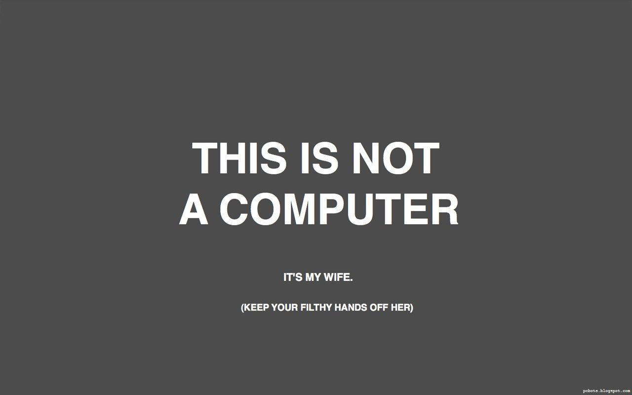 黑客 桌布 壁紙 — 粗體白色文字在純深灰色背景上宣告「THIS IS NOT A COMPUTER」，下方有較小文字。