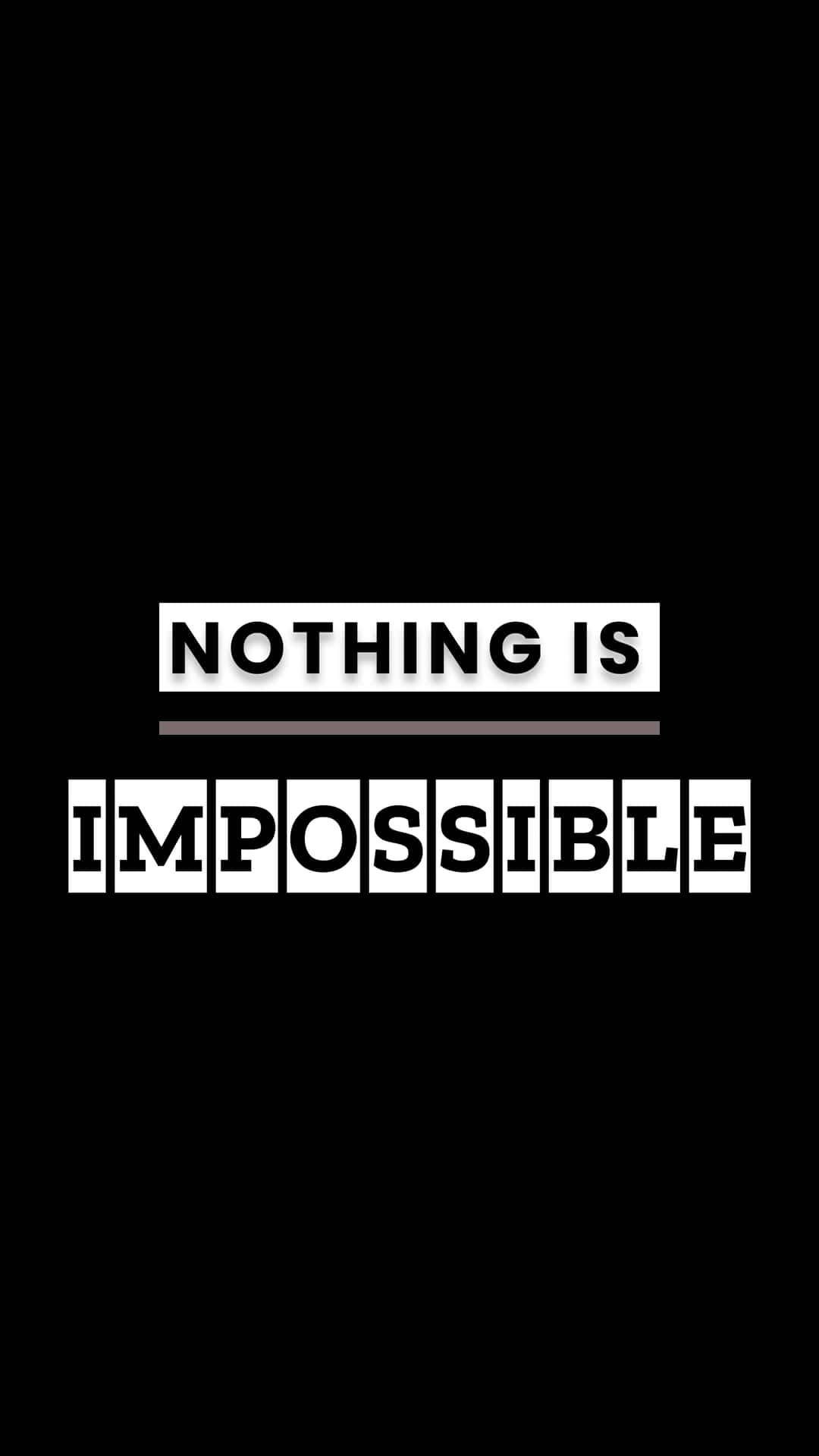 Nothing is Impossible Wallpaper 壁紙 — 粗體白色文字在黑色背景上以灰色底線宣告沒有不可能的事。