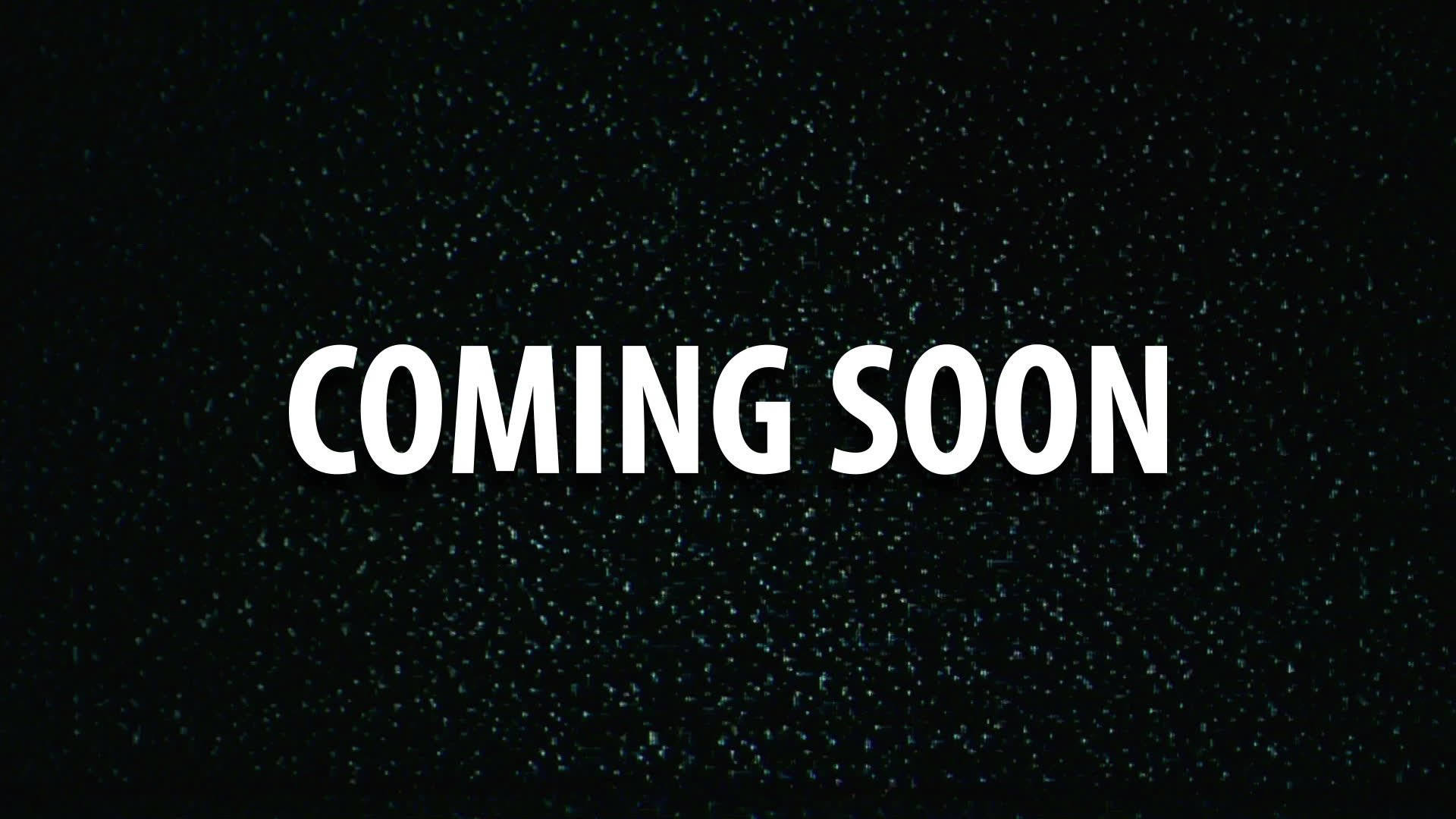 Coming Soon 桌布 壁紙 — 粗體白色文字寫著 COMING SOON，居中於一個類似太空的深色斑點背景上。