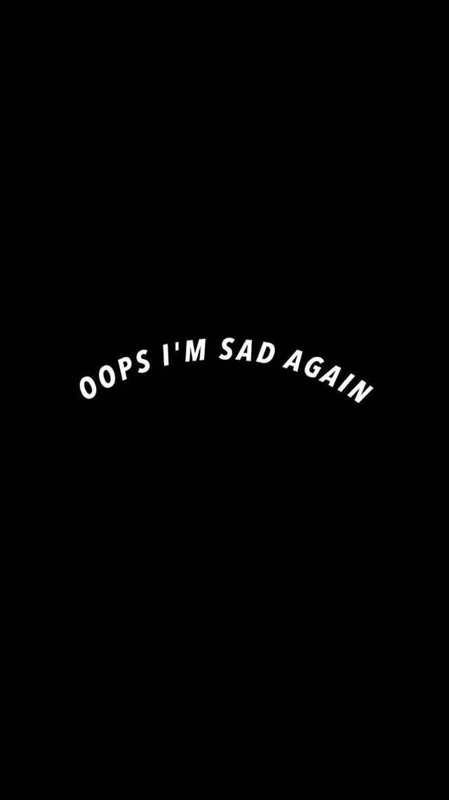 黑暗悲傷動圖 桌布 壁紙 — 粗體白色文字寫著 oops i'm sad again 在純黑色背景上輕輕彎曲。