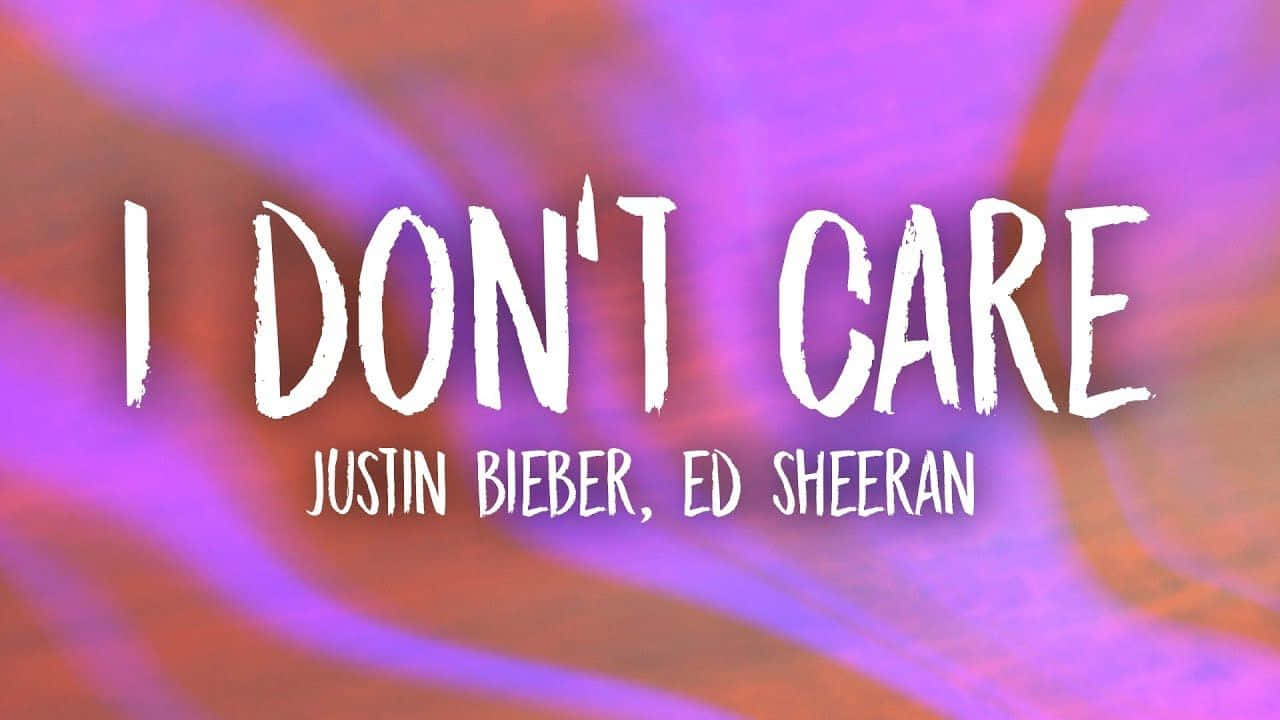 Dont Care 桌布 壁紙 — 粗體白色文字顯示Justin Bieber和Ed Sheeran的「I DON'T CARE」，背景為充滿活力的紫色和橙色抽象背景。