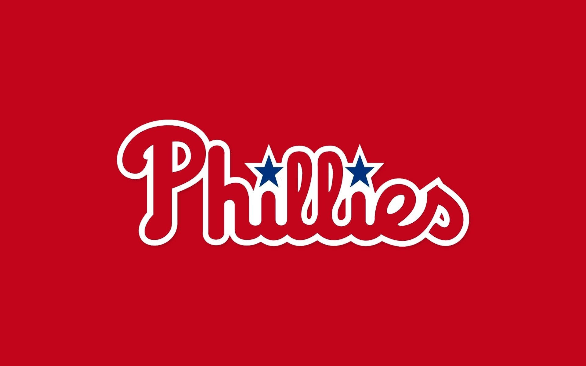 Phillies 桌布 壁紙 — 粗體白色草書Phillies標誌，在純紅色背景上有兩顆藍色星星。