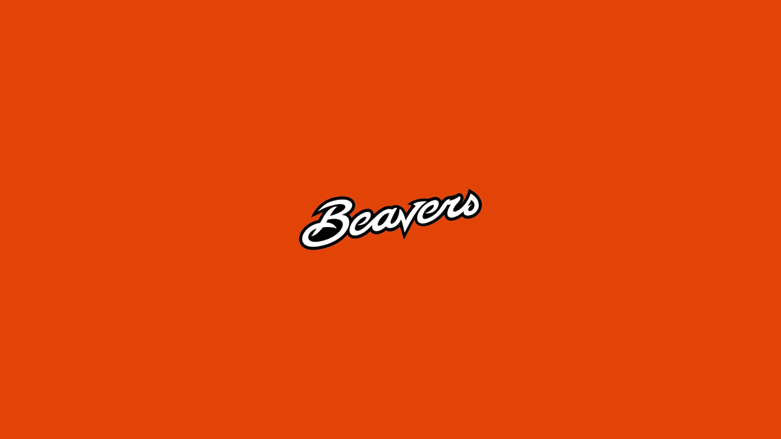 Oregon 桌布 壁紙 — 粗體白色草書文字 'Beavers' 居中於純橙色背景上。