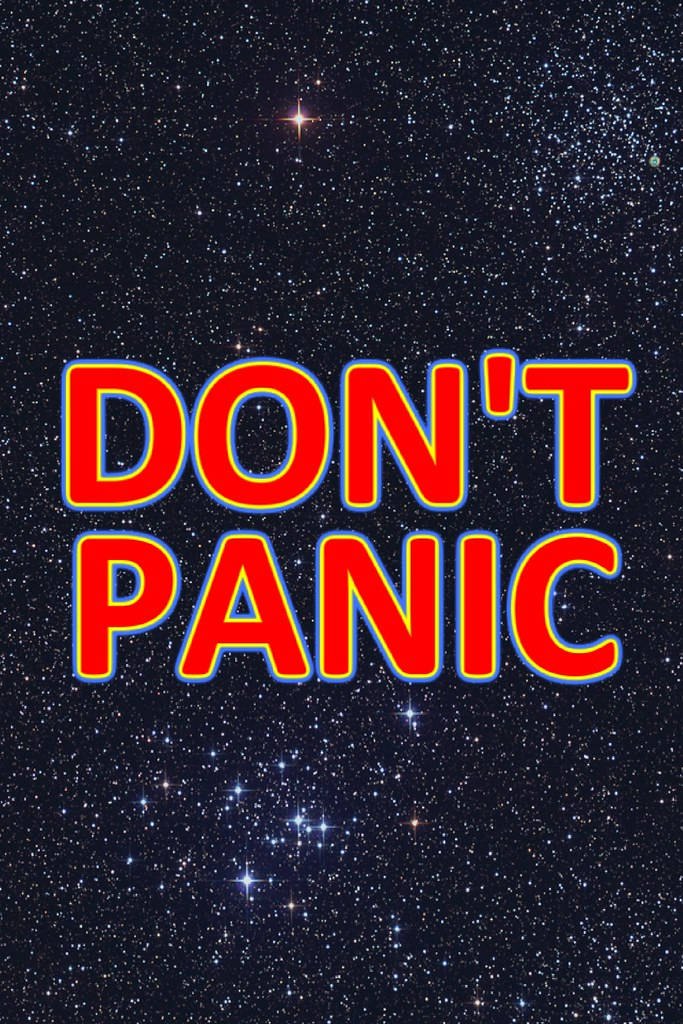 Panic 桌布 壁紙 — 粗體紅色 'DON'T PANIC' 文字搭配藍色輪廓，漂浮在繁星點點的宇宙夜空中。
