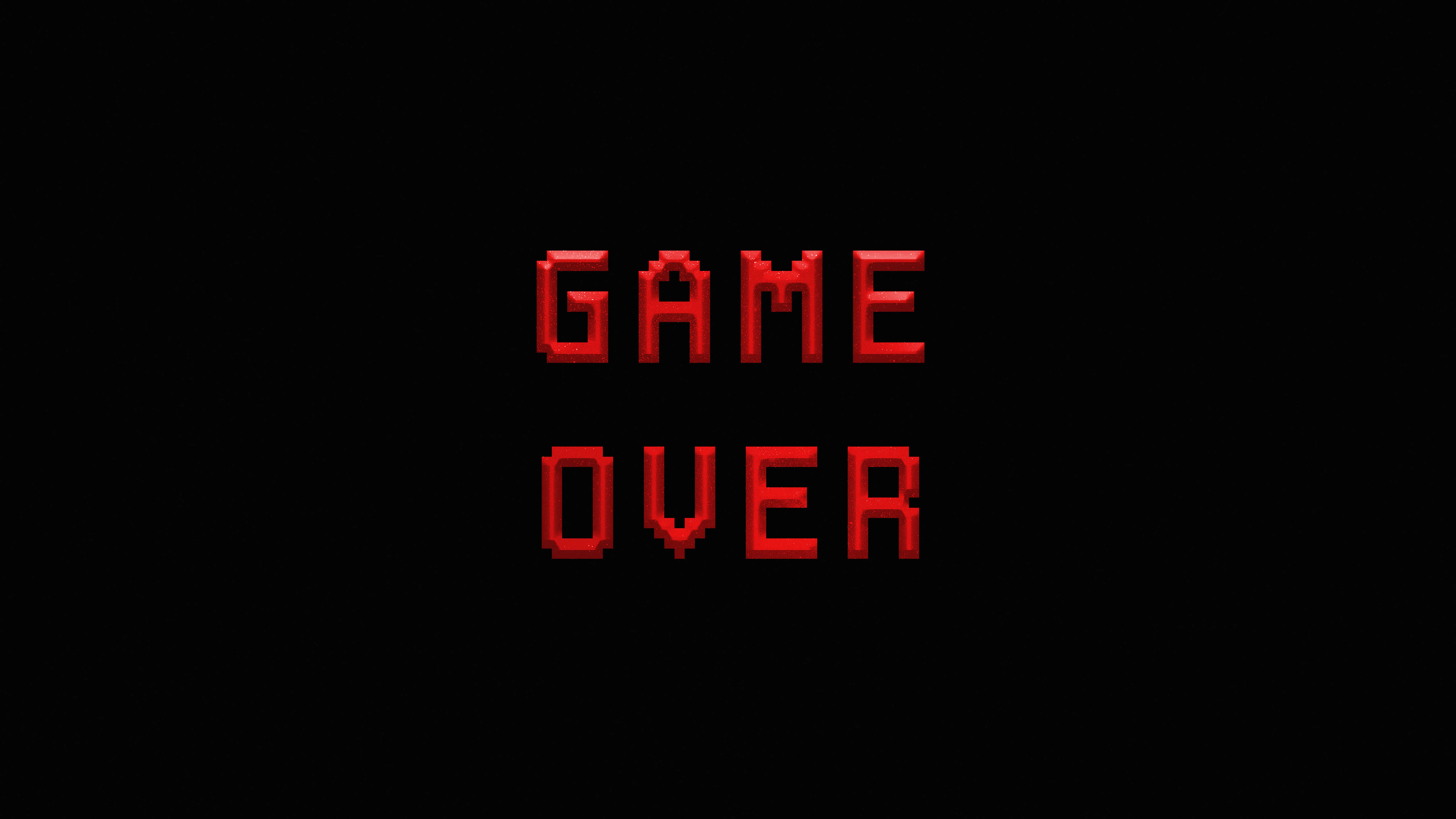 Dark Game Over 桌布 壁紙 — 粗體紅色像素化遊戲結束文字，居中於純黑色背景上。
