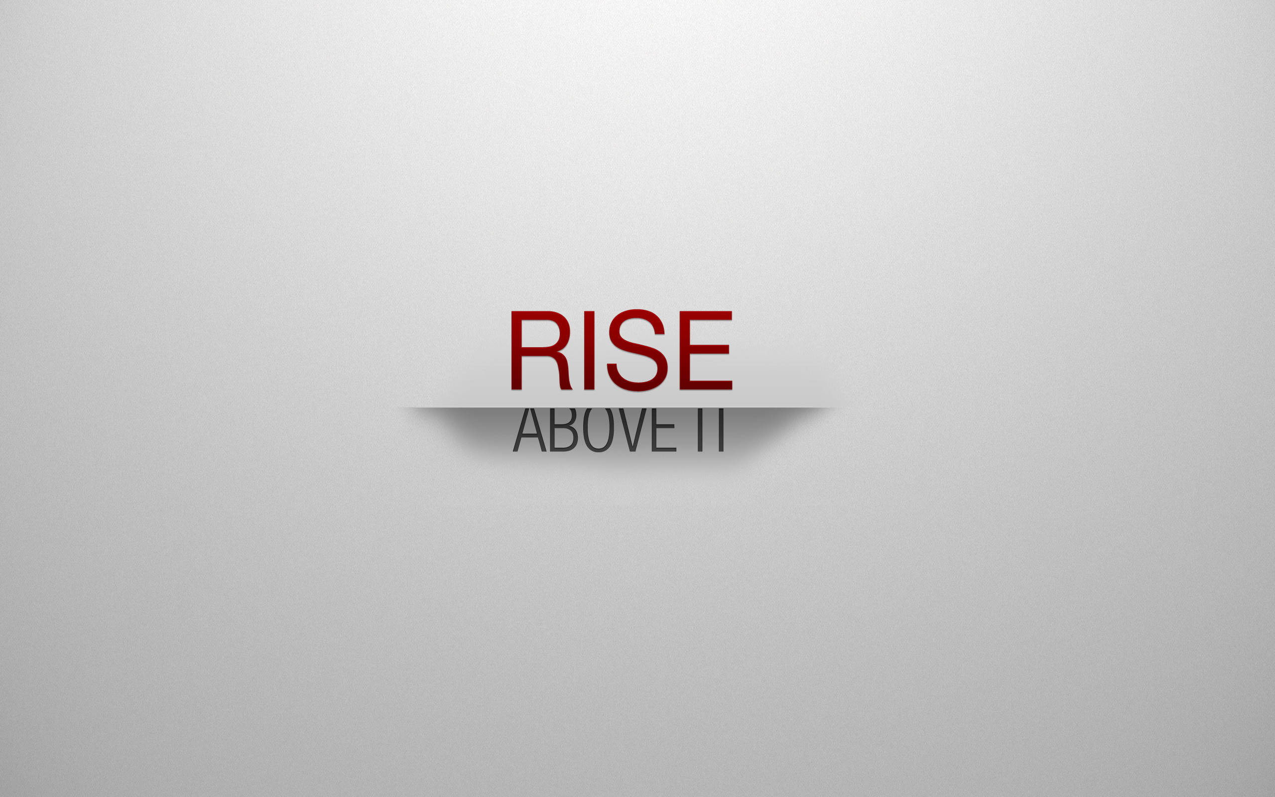 激勵 桌布 壁紙 — 粗體紅色文字「RISE ABOVE IT」從灰色表面浮現，帶有微妙的陰影效果。