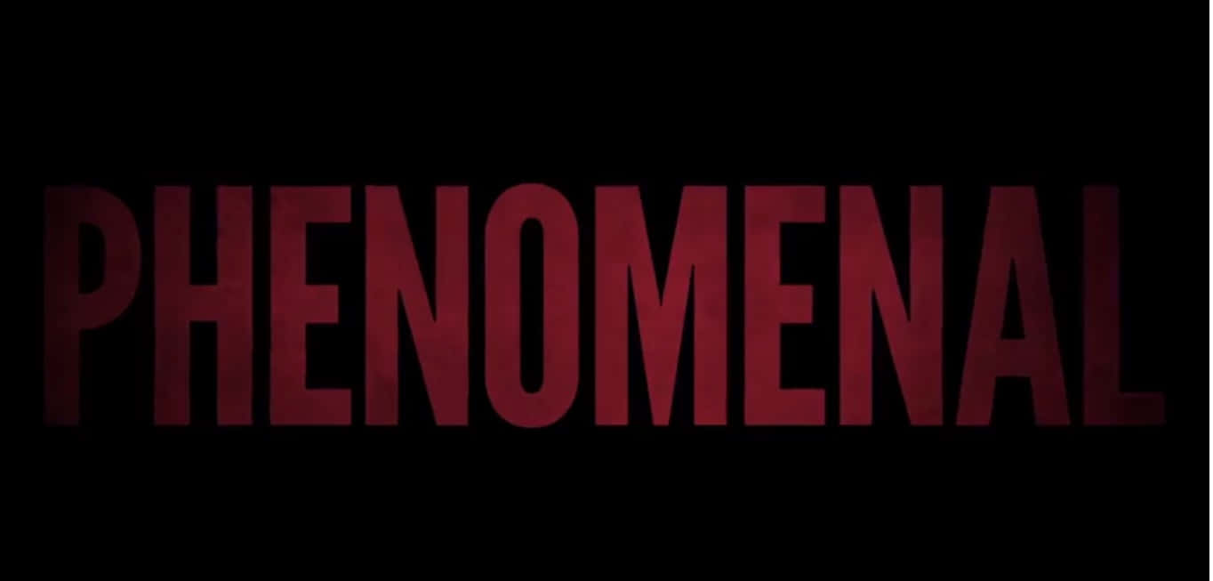 Phenomenal 桌布 壁紙 — 粗體紅色文字拼寫出 phenomenal，在純黑色背景上微弱發光。