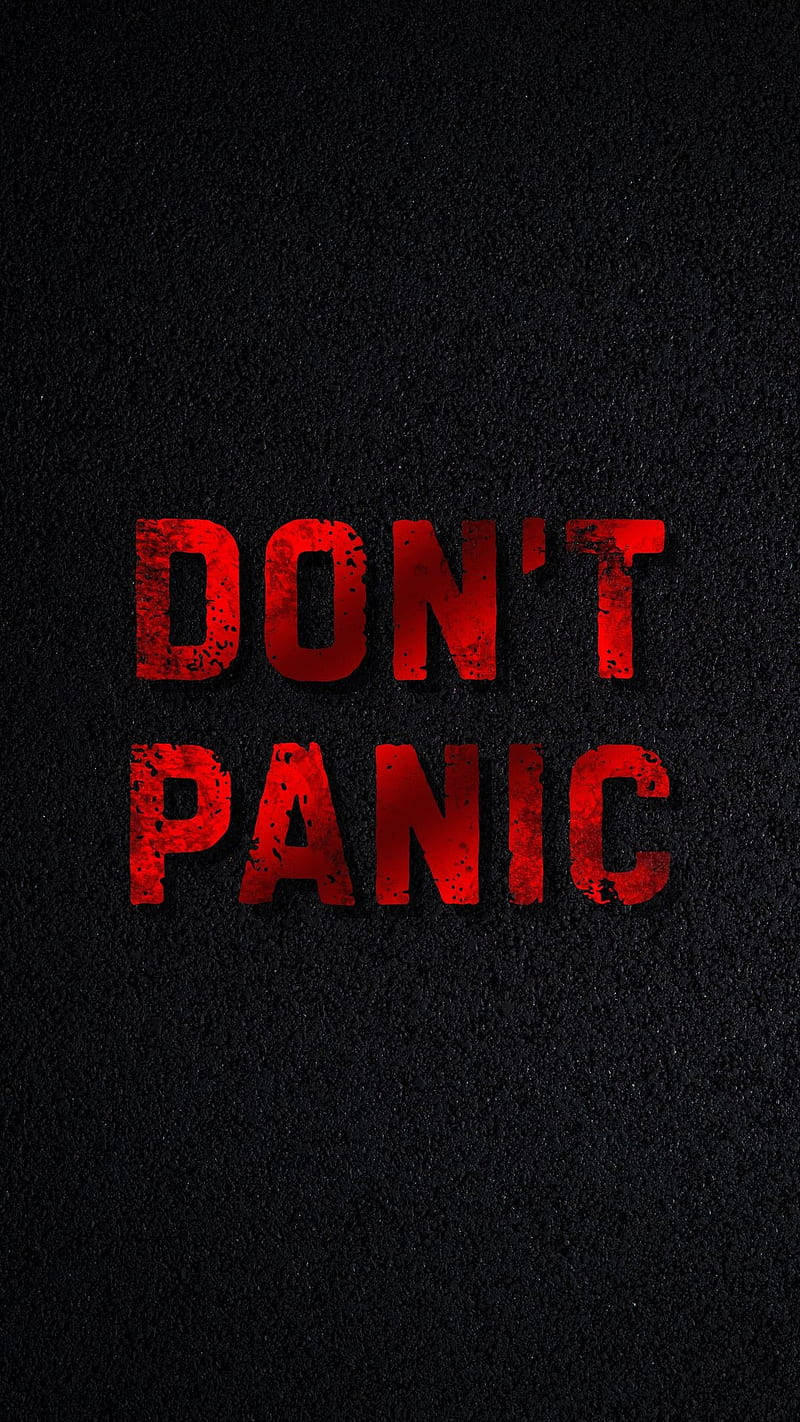 Panic 桌布 壁紙 — 粗體紅色磨損文字「DON'T PANIC」在紋理黑色背景上突出顯示。