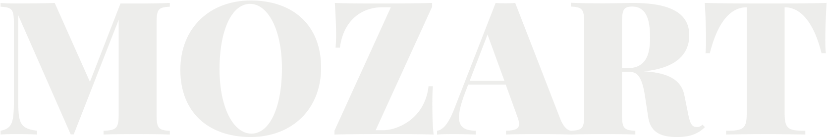mozart 桌布 壁紙 — 粗體銀色襯線文字在純黑背景上拼出 MOZART。