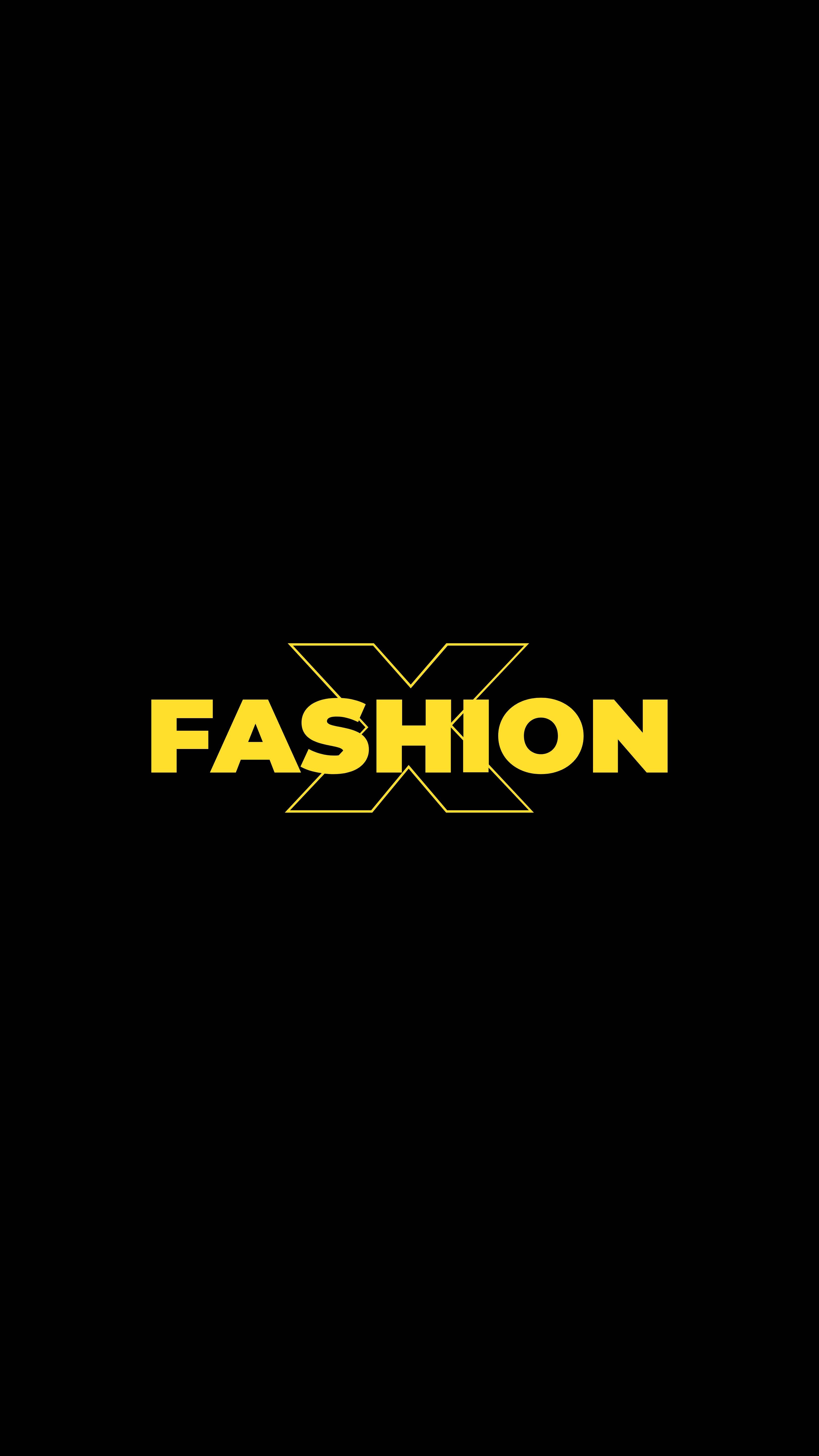 時尚 桌布 壁紙 — 粗體黃色「FASHION」文字，帶有風格化X圖案，居中於純黑色背景上。