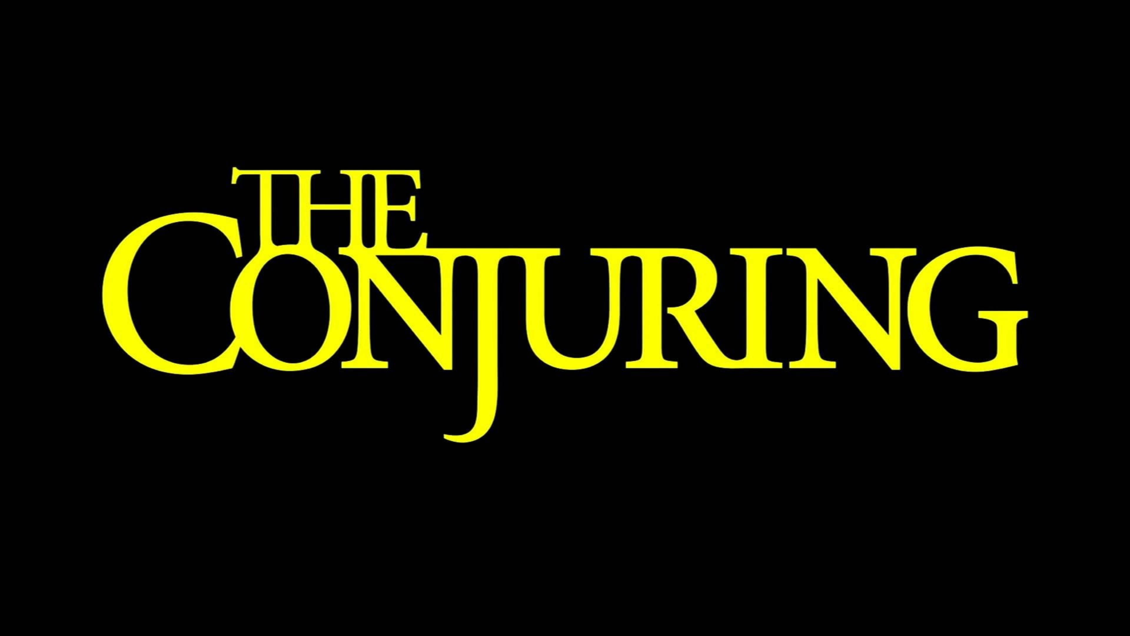 Conjuring 桌布 壁紙 — 粗體黃色襯線文字拼出 'THE CONJURING'，背景為純黑色。