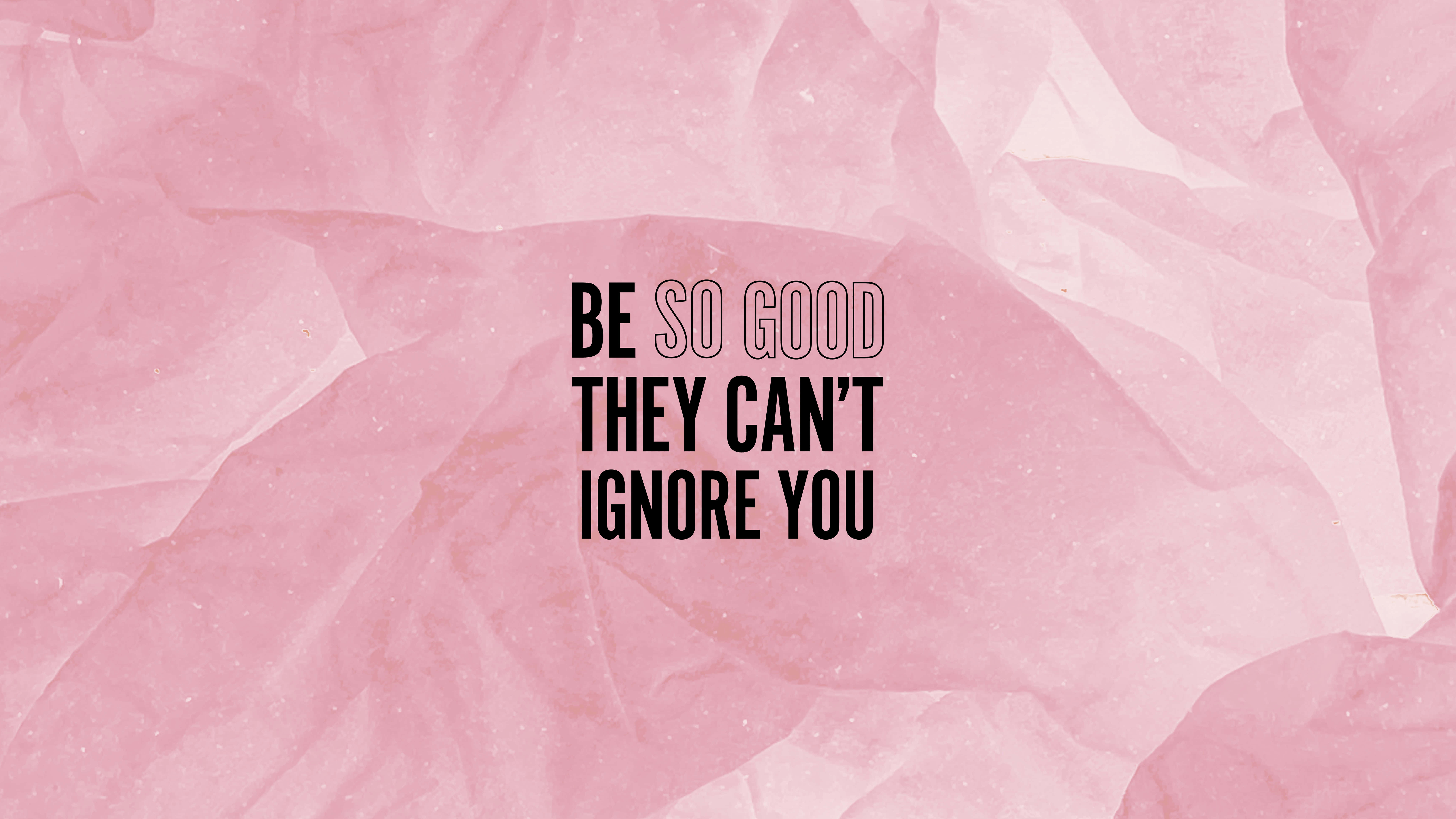 勵志動圖 桌布 壁紙 — 粗體黑色勵志文字寫著「be so good they can't ignore you」，背景是柔軟的粉紅色皺紙。