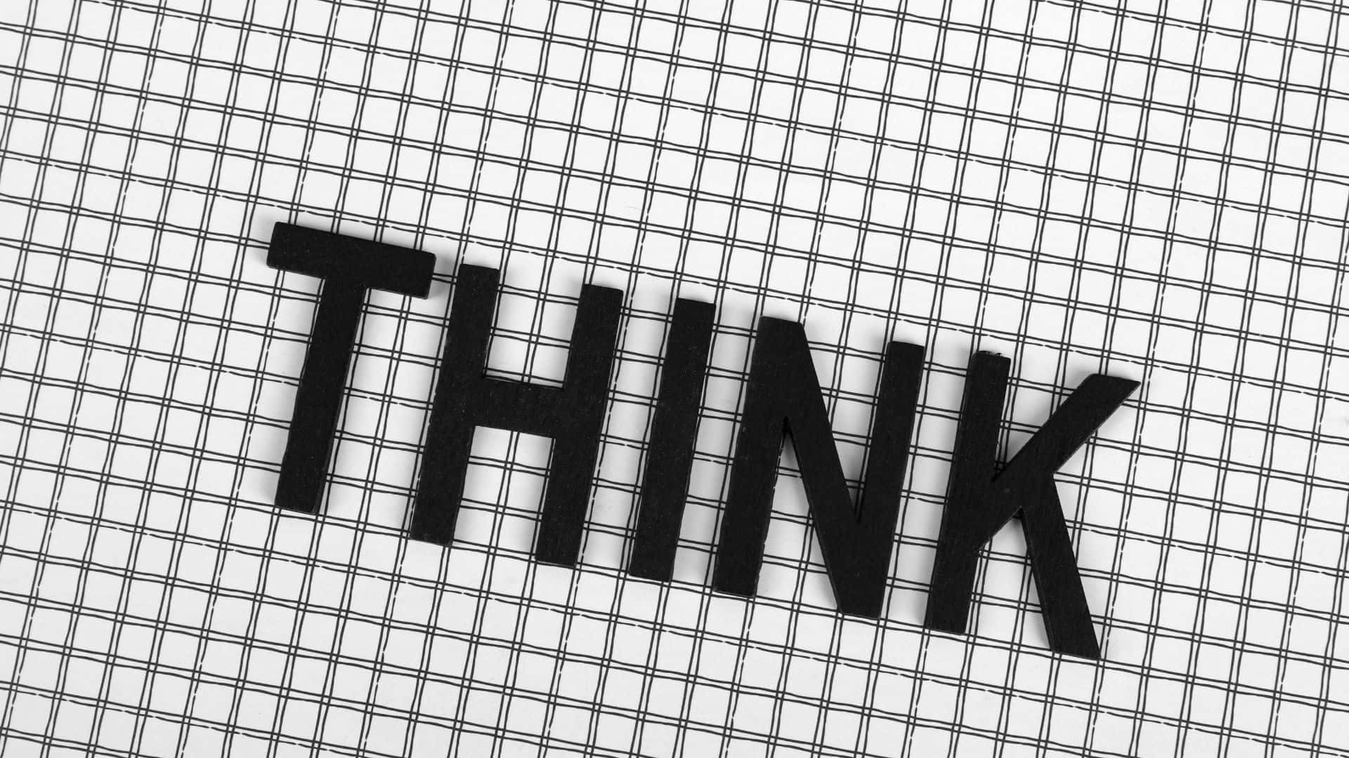 Black And White Word 桌布 壁紙 — 粗體黑色字母拼寫THINK，放置在白色網格背景上，具有銳利的幾何精確度。