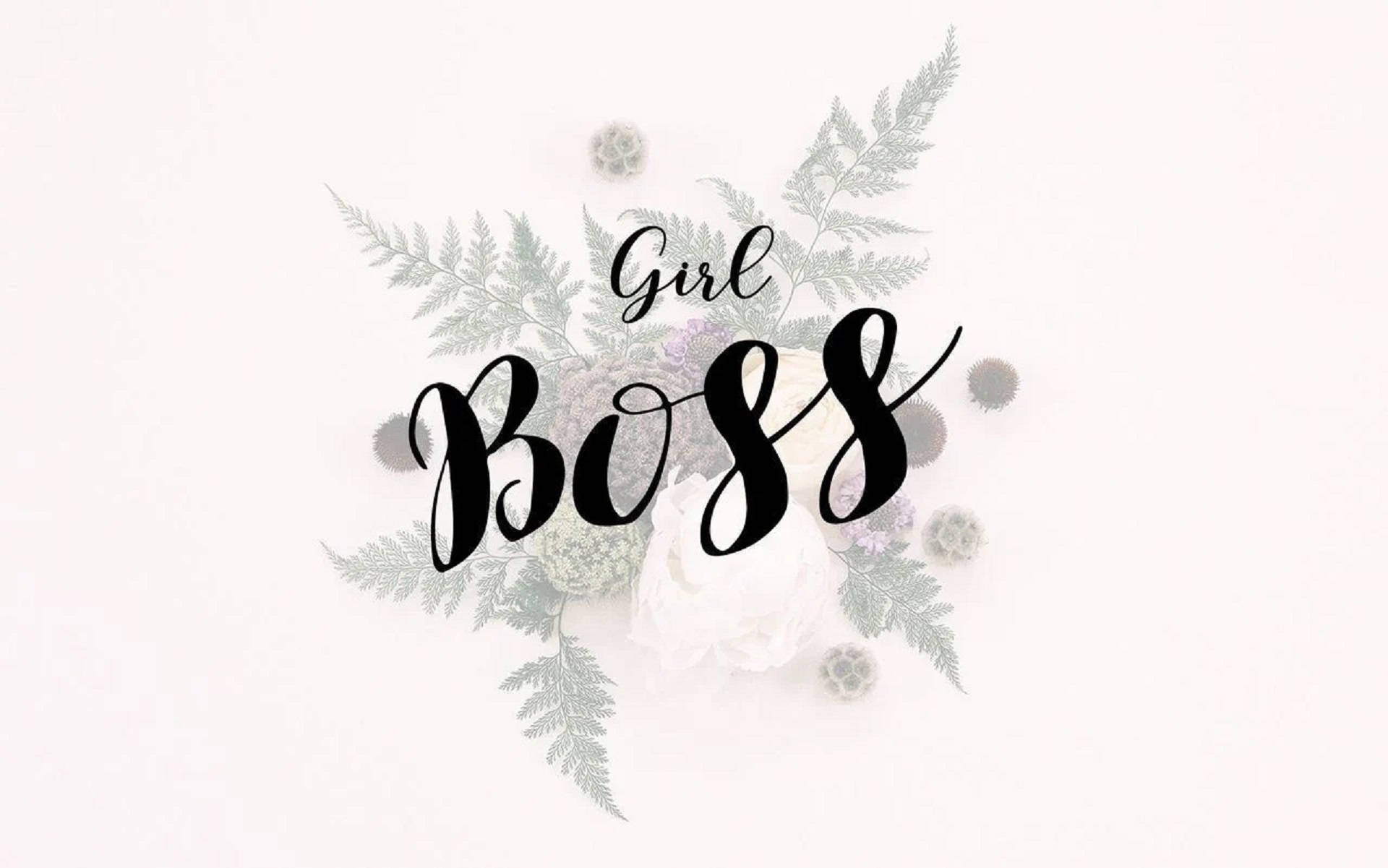 boss 桌布 壁紙 — 粗體黑色字體寫著「Girl Boss」，周圍環繞著精緻的蕨類植物和柔軟的白色花朵，背景為潔淨的白色。