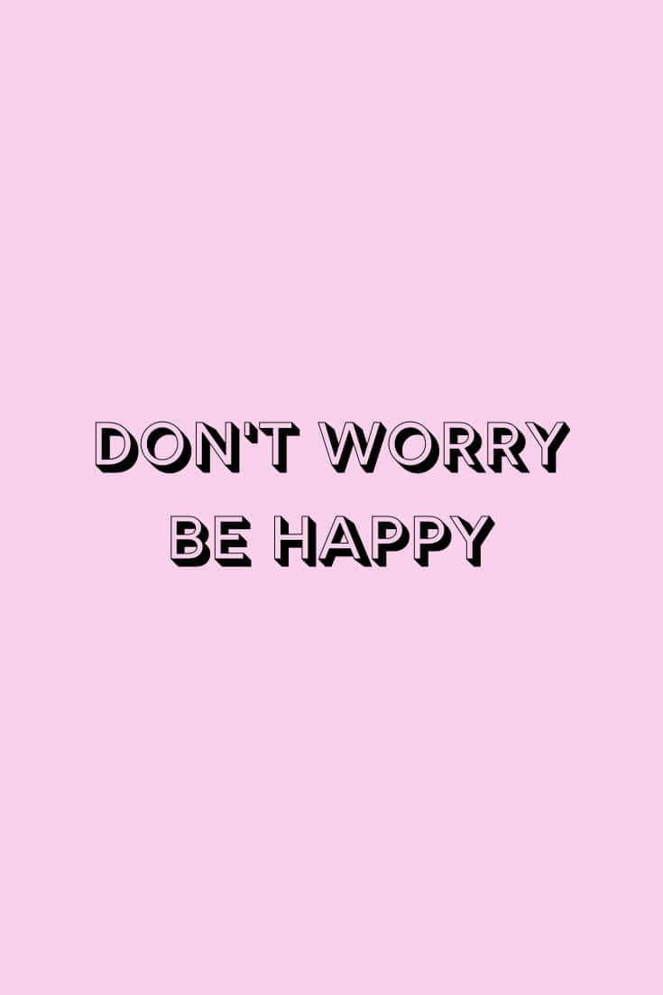 Dont Worry Be Happy 桌布 壁紙 — 粗體黑色文字 'DON'T WORRY BE HAPPY' 居中顯示在純色粉彩粉紅背景上。