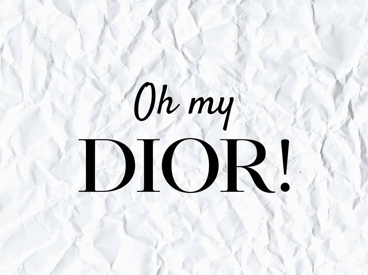 在皺巴巴的白色紙張背景上顯示「Oh my DIOR」的文字圖形。 — Dior 動態 壁紙