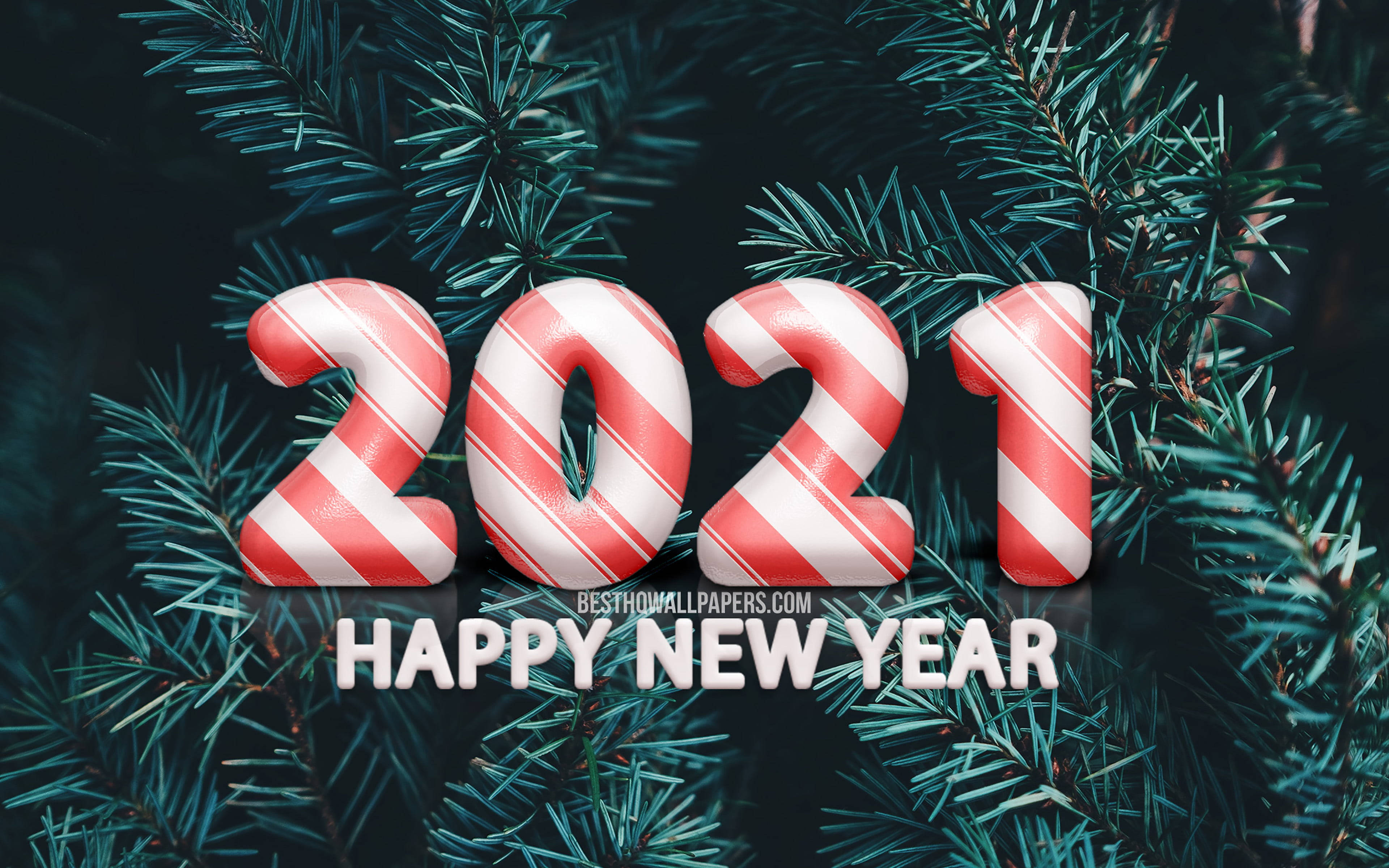 新年快樂 桌布 壁紙 — 糖果棒條紋的2021數字在深色松枝上發光，下方有「happy new year」文字。