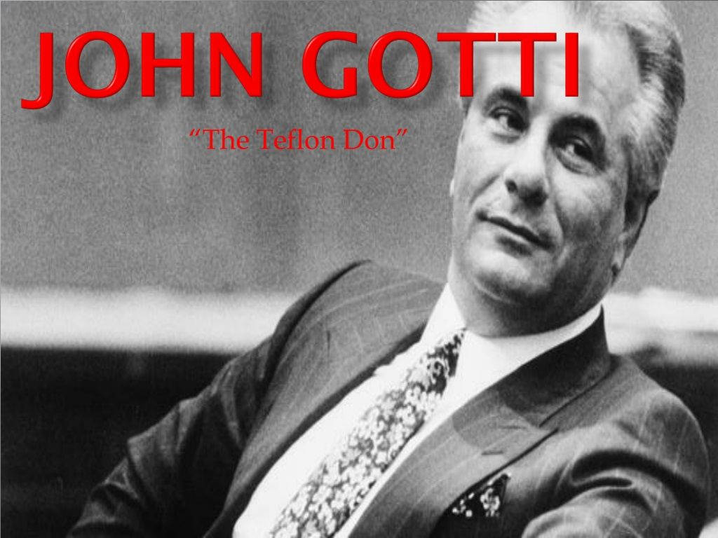 Gotti 桌布 壁紙 — 約翰·高蒂穿著西裝的黑白肖像，帶有紅色文字疊加，顯示「JOHN GOTTI」和「The Teflon Don」。
