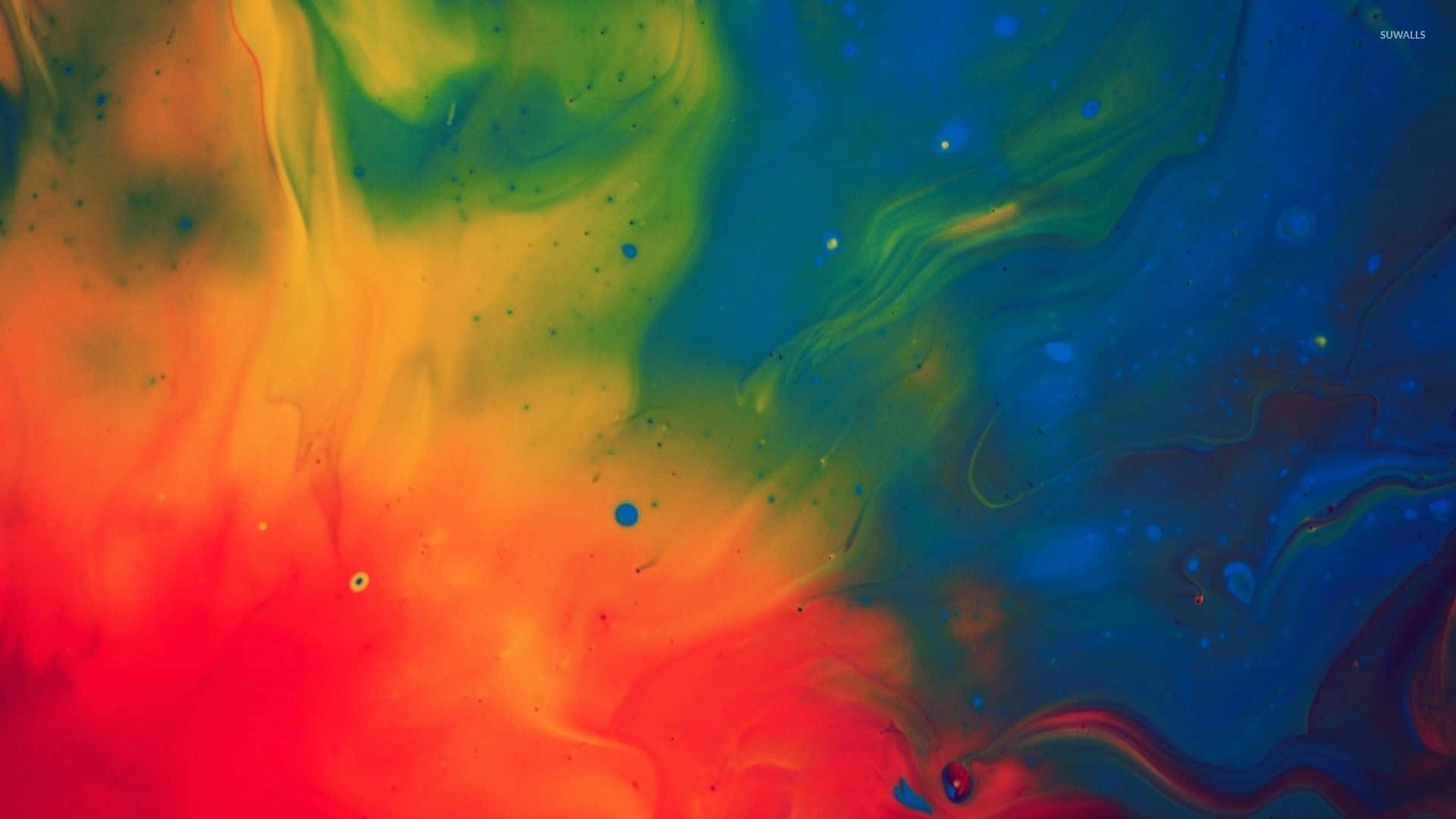 Painting 桌布 壁紙 — 紅、橙、黃、綠、藍的鮮豔漩渦色彩在流動的抽象圖案中融合，並帶有散落的水滴。